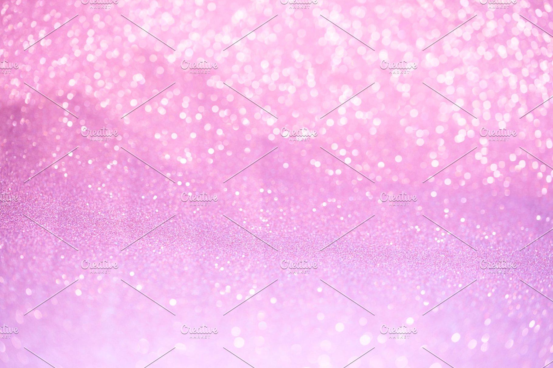 Pink glitter surface with pink light bokeh can be used for background for special occasions promotion campaign or product display