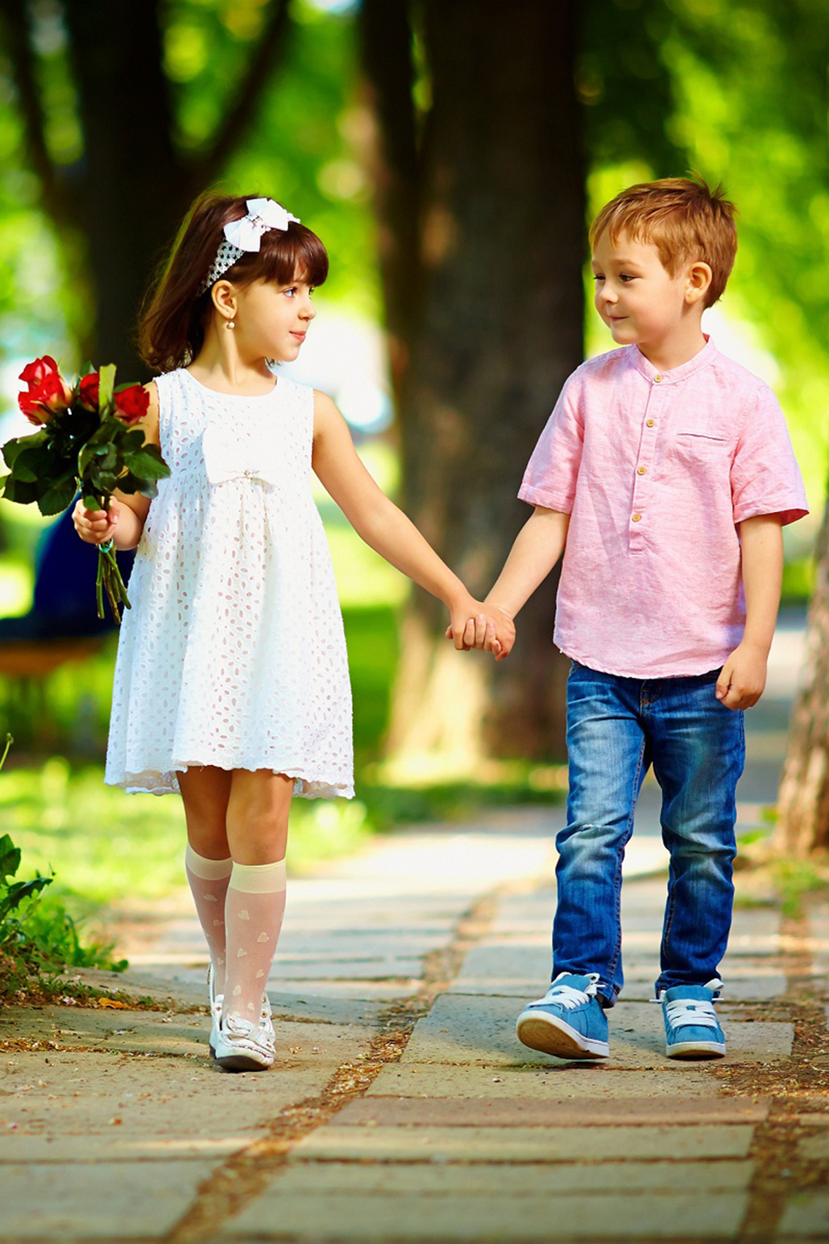 Beautiful hands holding cute kids couple mobile wallpaper