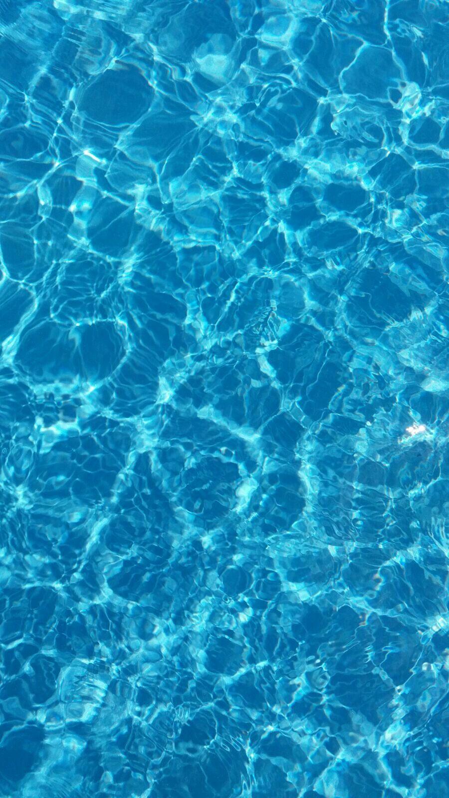 Background with light blue water. Water aesthetic