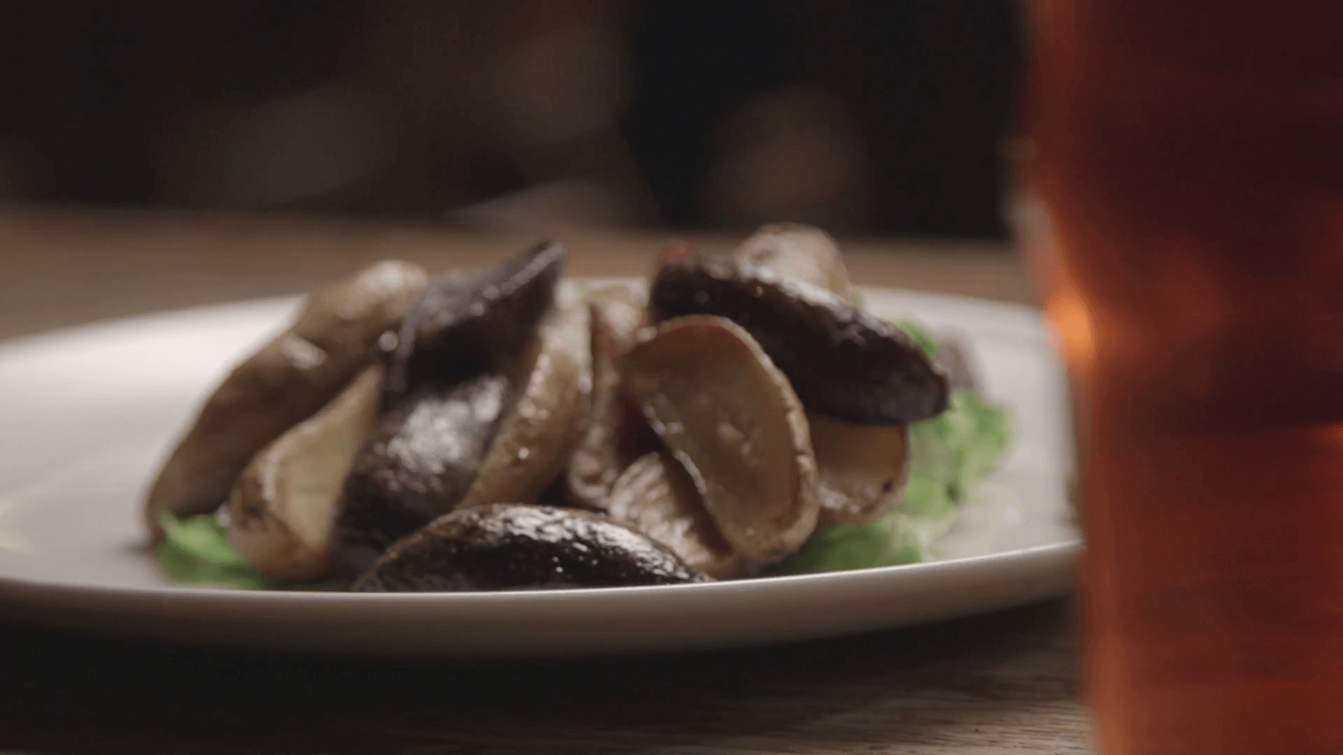 Delicious food and beer plated on rustic setting. Stock Video Footage