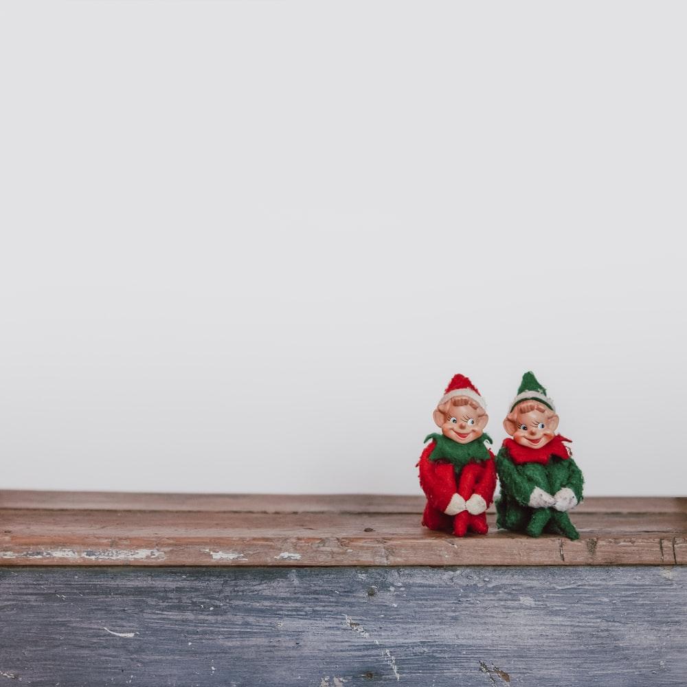 two elf on the shelf figurines photo