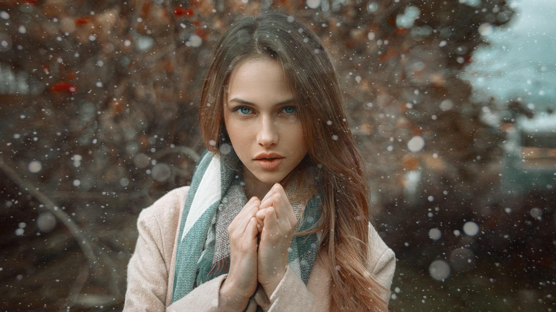 Woman wearing brown coat with green scarf during winter HD