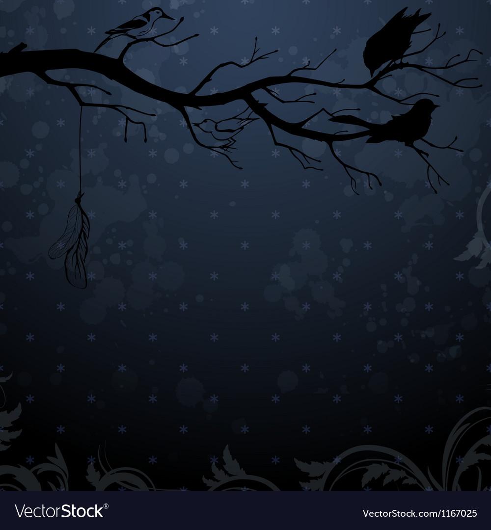 Dark winter background with tree branch and birds
