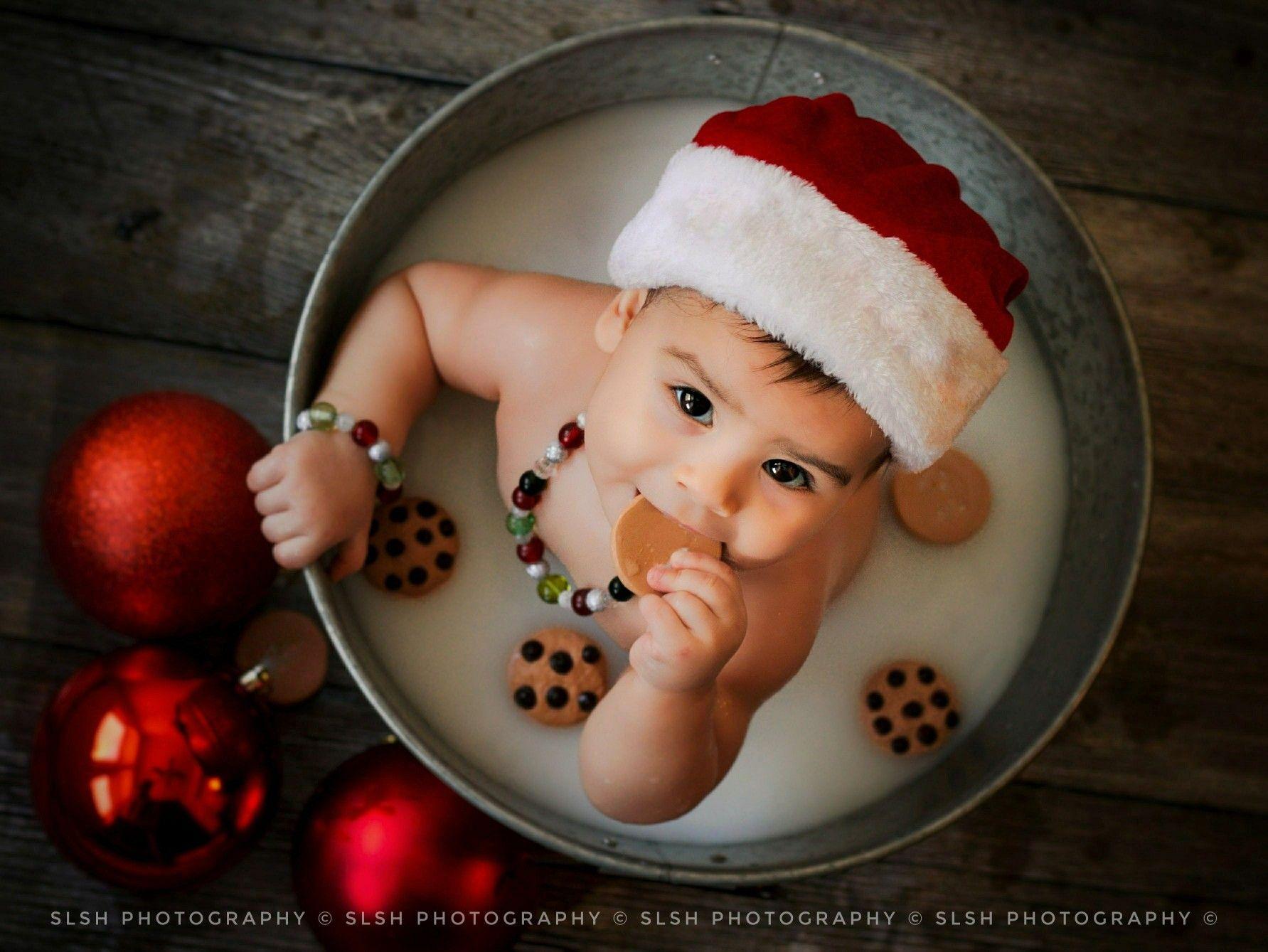 Baby cookies and milk bath Christmas photography. Milk bath