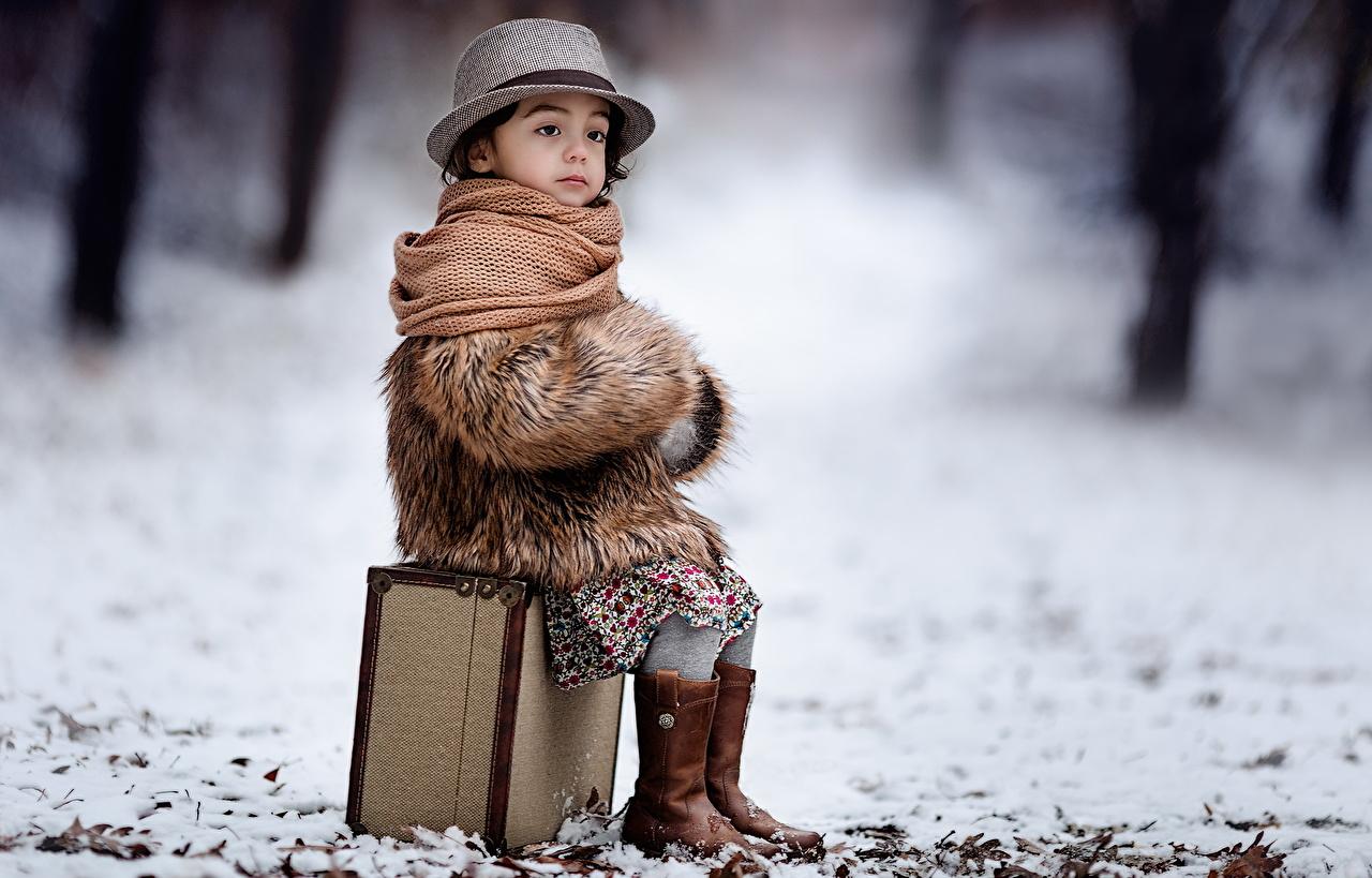 Desktop Wallpaper Little girls child Hat Winter Suitcase Sitting