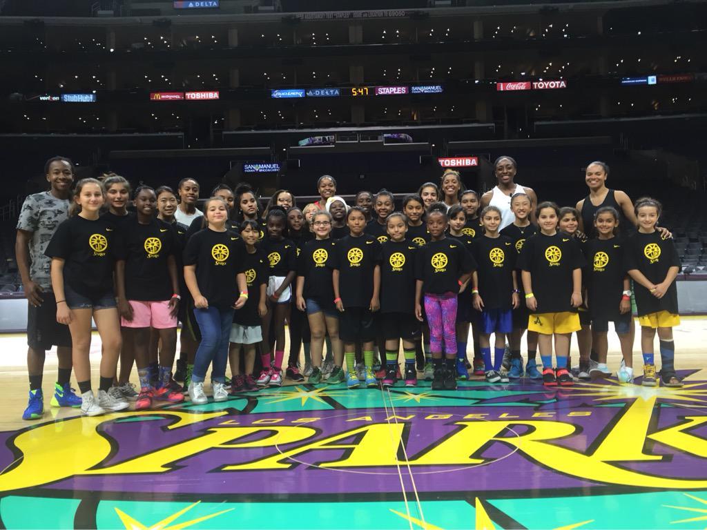 Kristi Toliver fun w the kids after the win