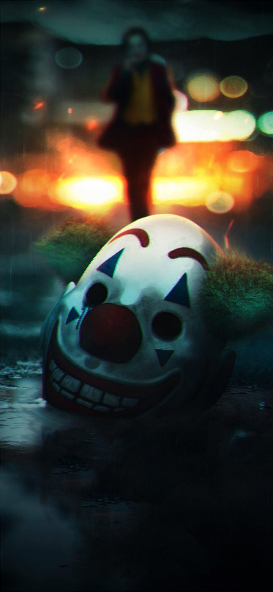 the joker mask off iPhone X Wallpaper Free Download
