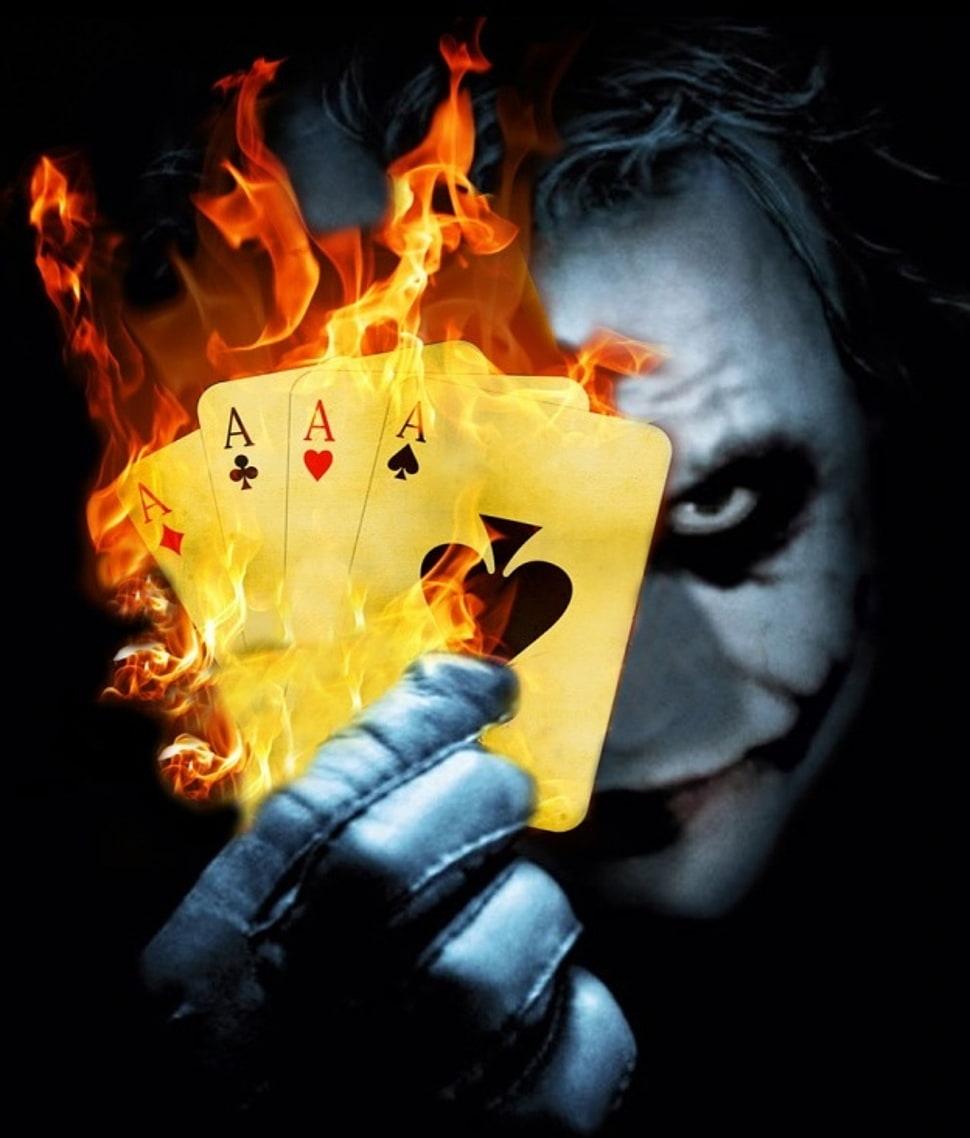 Joker holding four flaming ace playing cards illustration HD