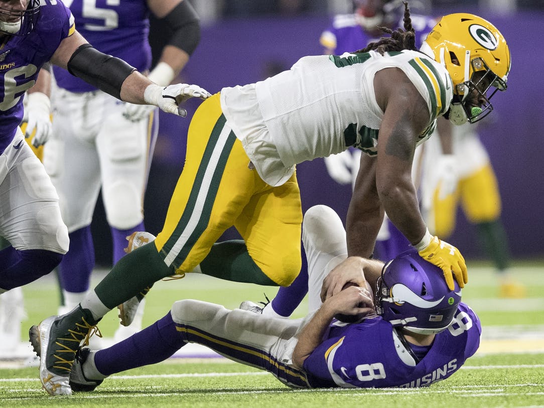 Photos: Packers win NFC North with victory over Vikings.
