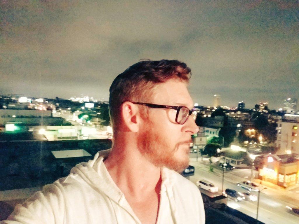 Zack Ward party on a rooftop patio. I