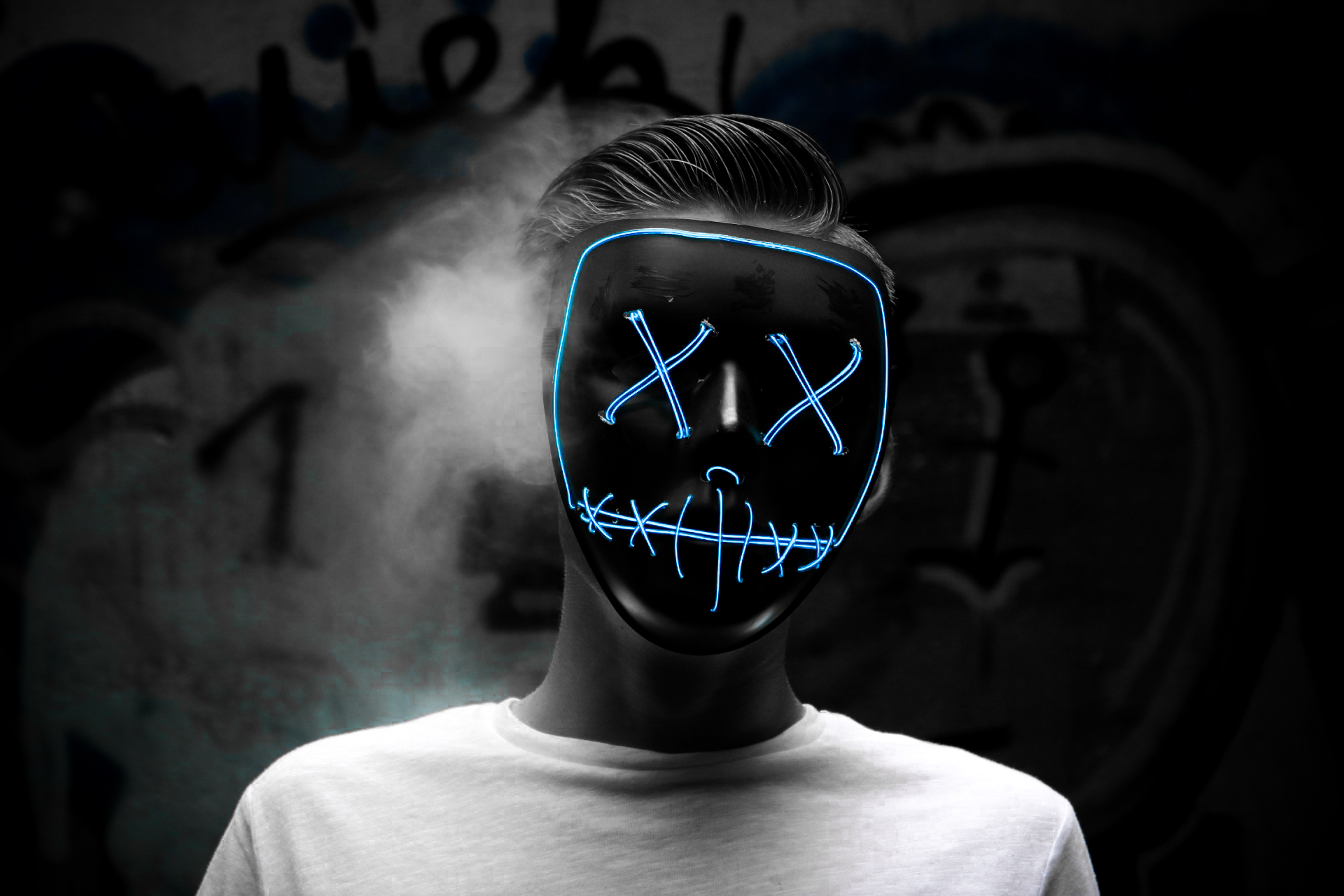 Grayscale Photo of Man Wearing Blue Mask · Free