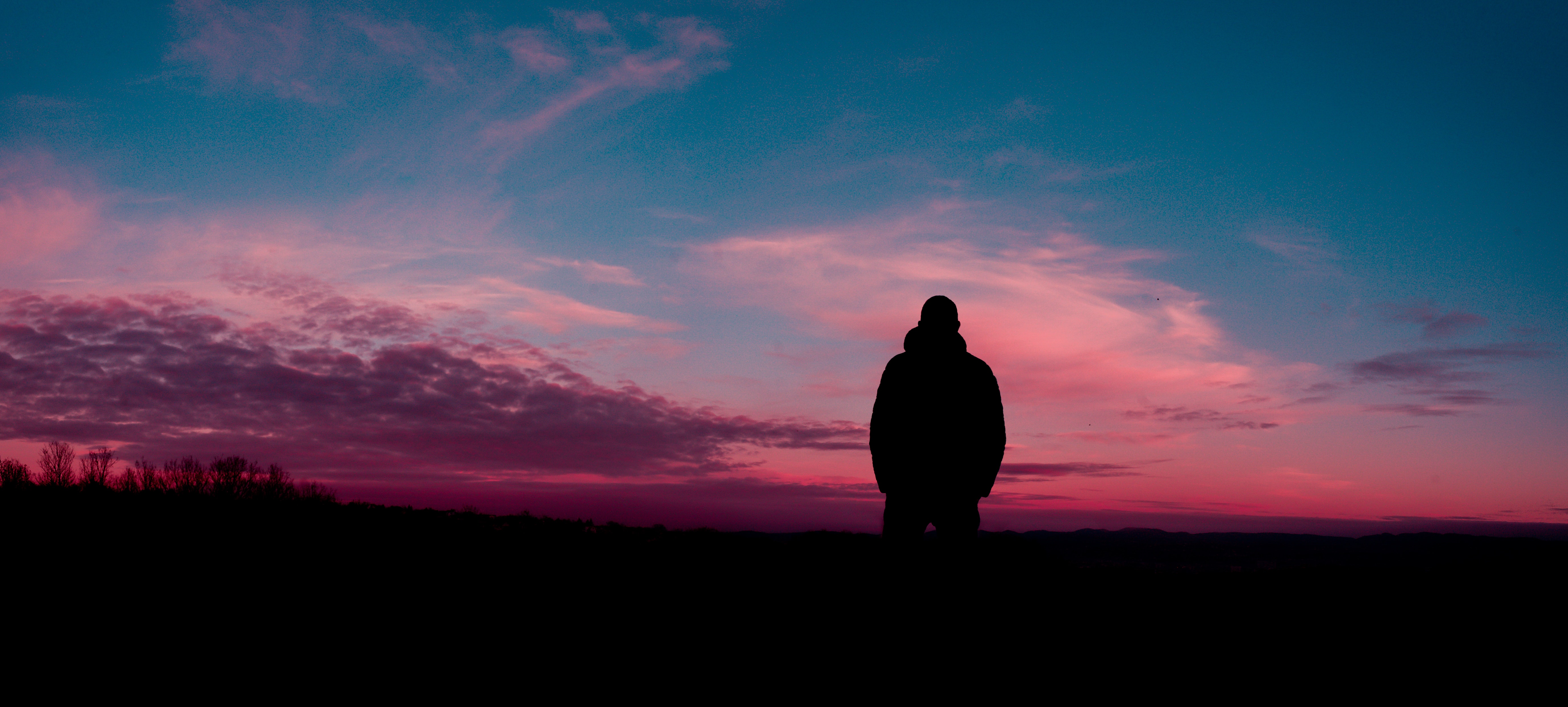 Silhouette of Human With Sunset Background · Free