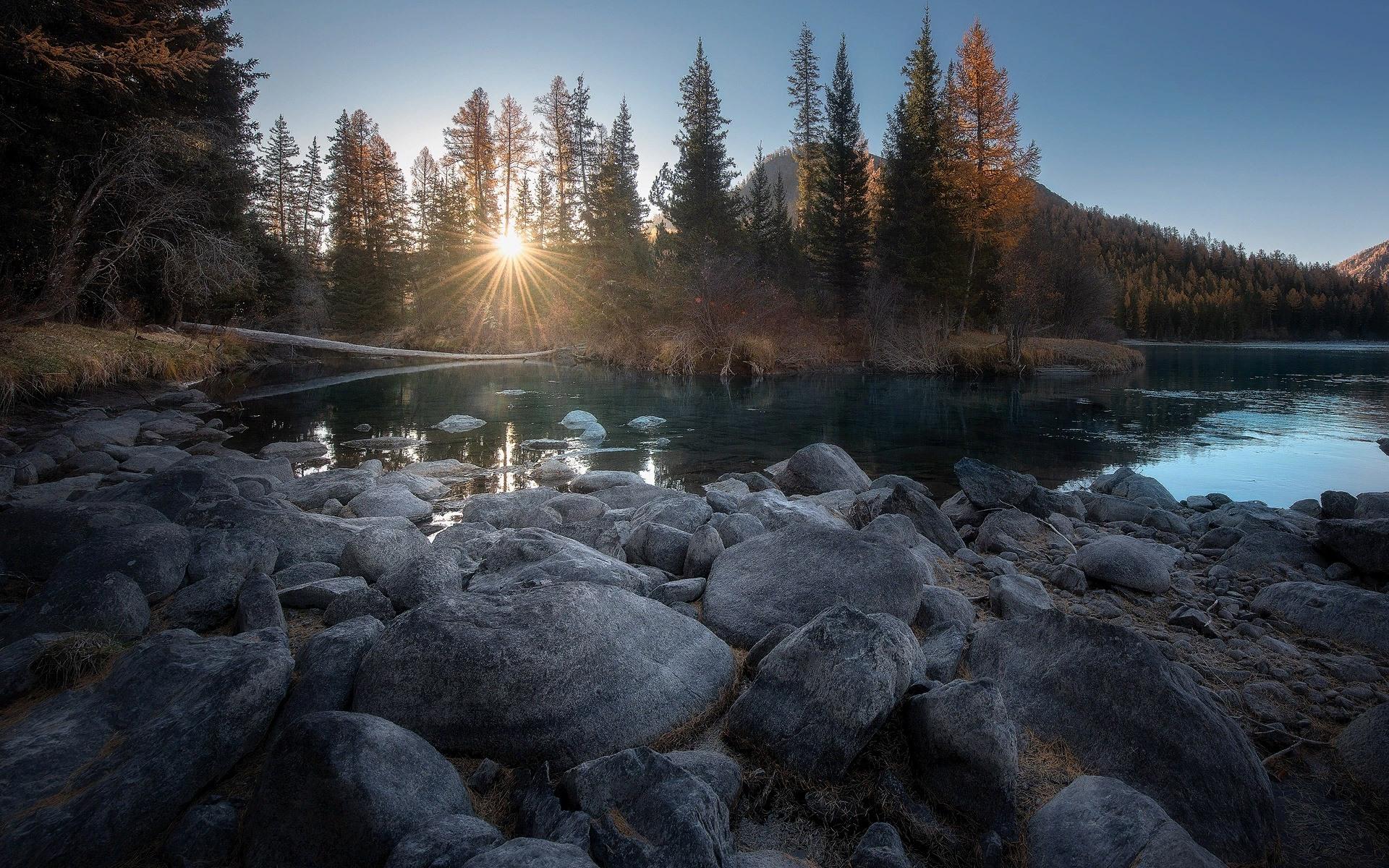 Wallpaper Stones, trees, sun rays, water, river, autumn