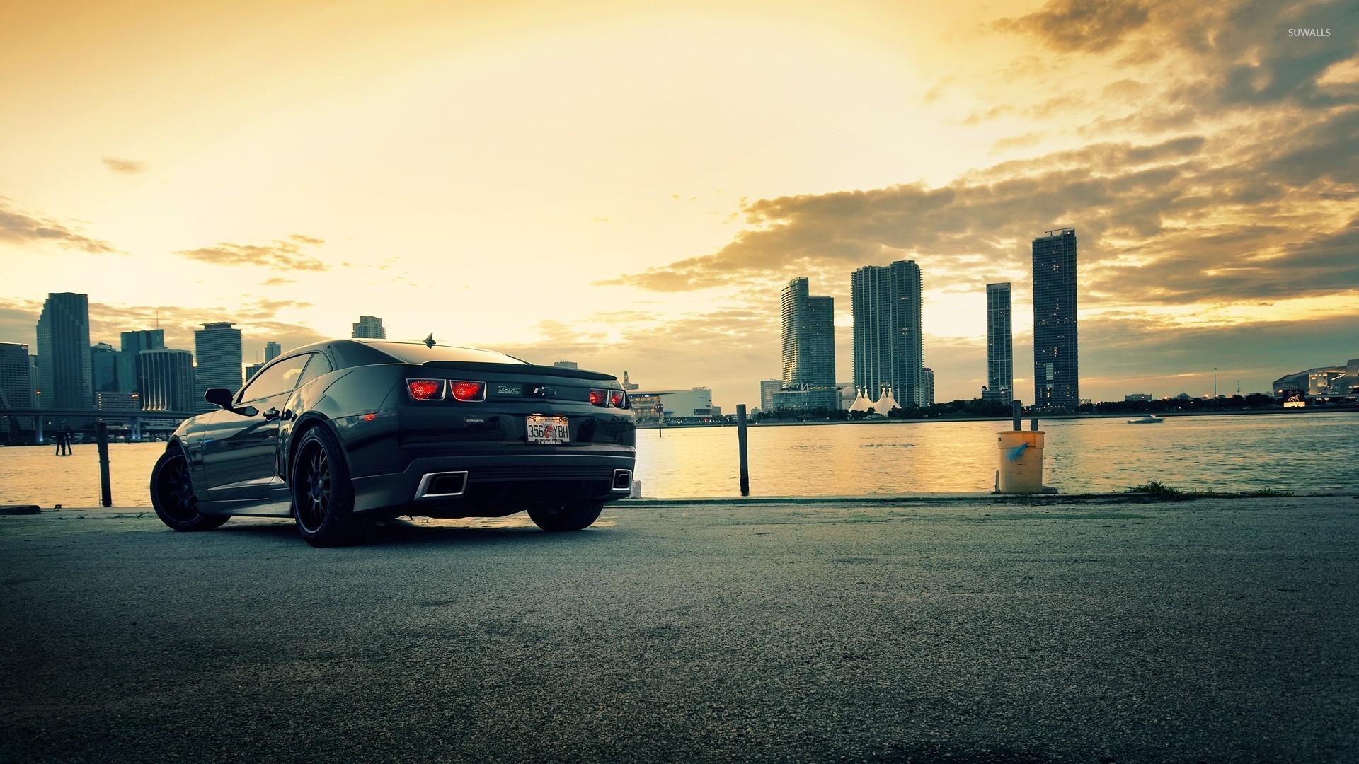 Back side view of a Chevrolet Camaro at sunset wallpaper