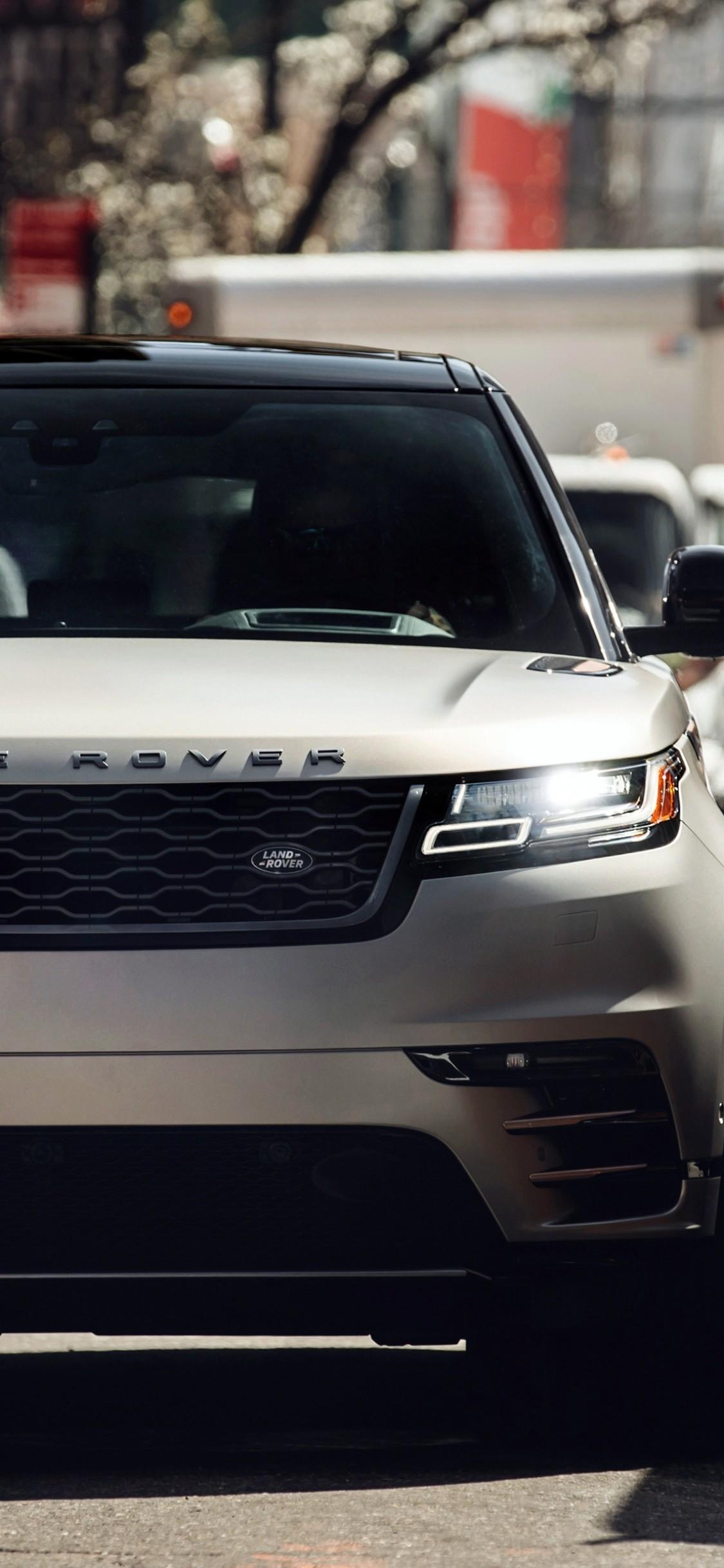Download 1125x2436 Range Rover Velar, Urban, People, Street
