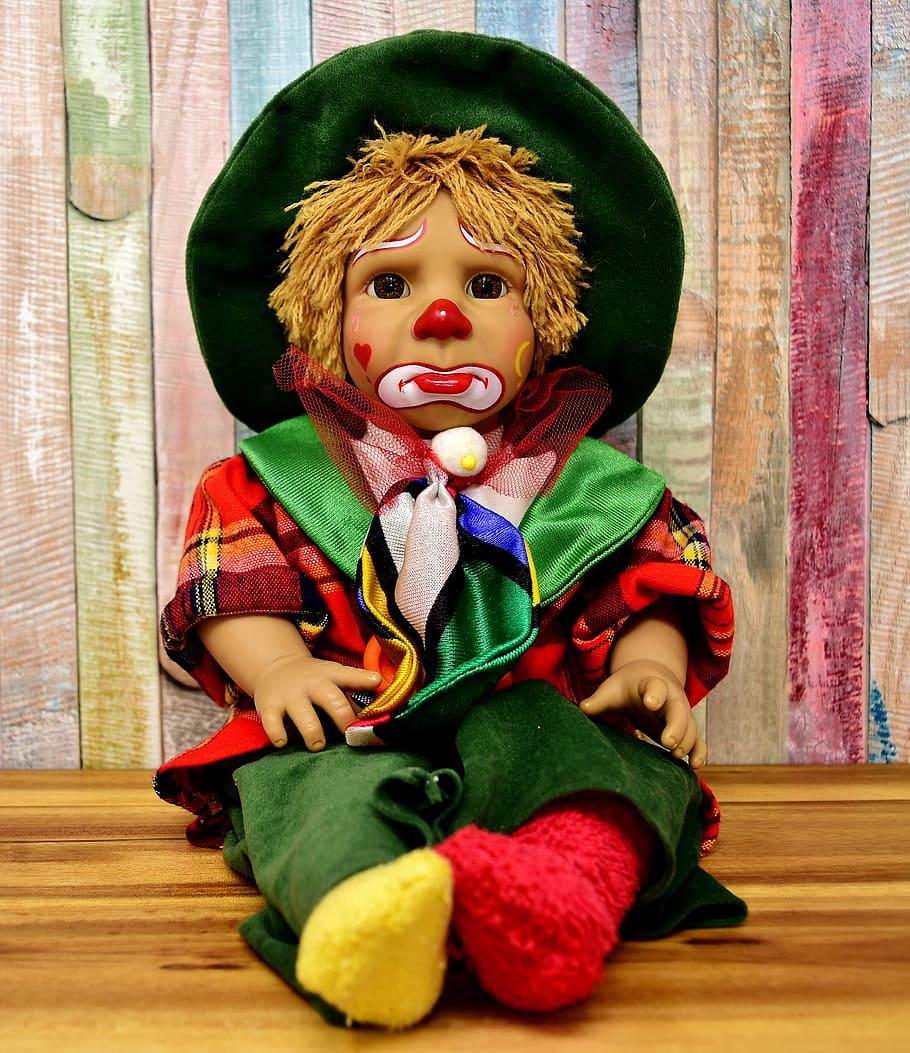 HD wallpaper: jester boy with green hat doll, clown, cute, sad