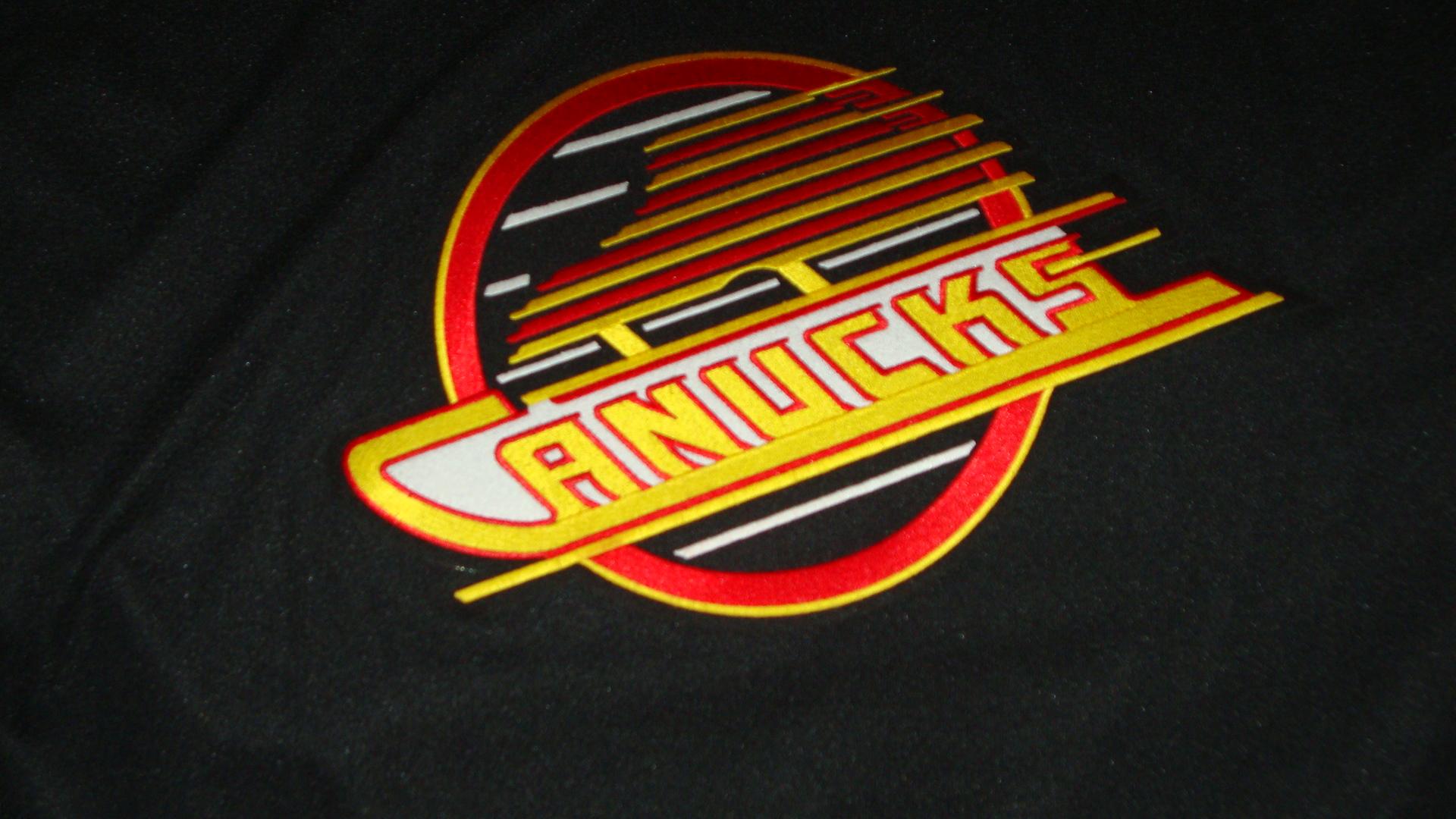 Vintage hockey NHL crest jersey skates Vancouver Canucks