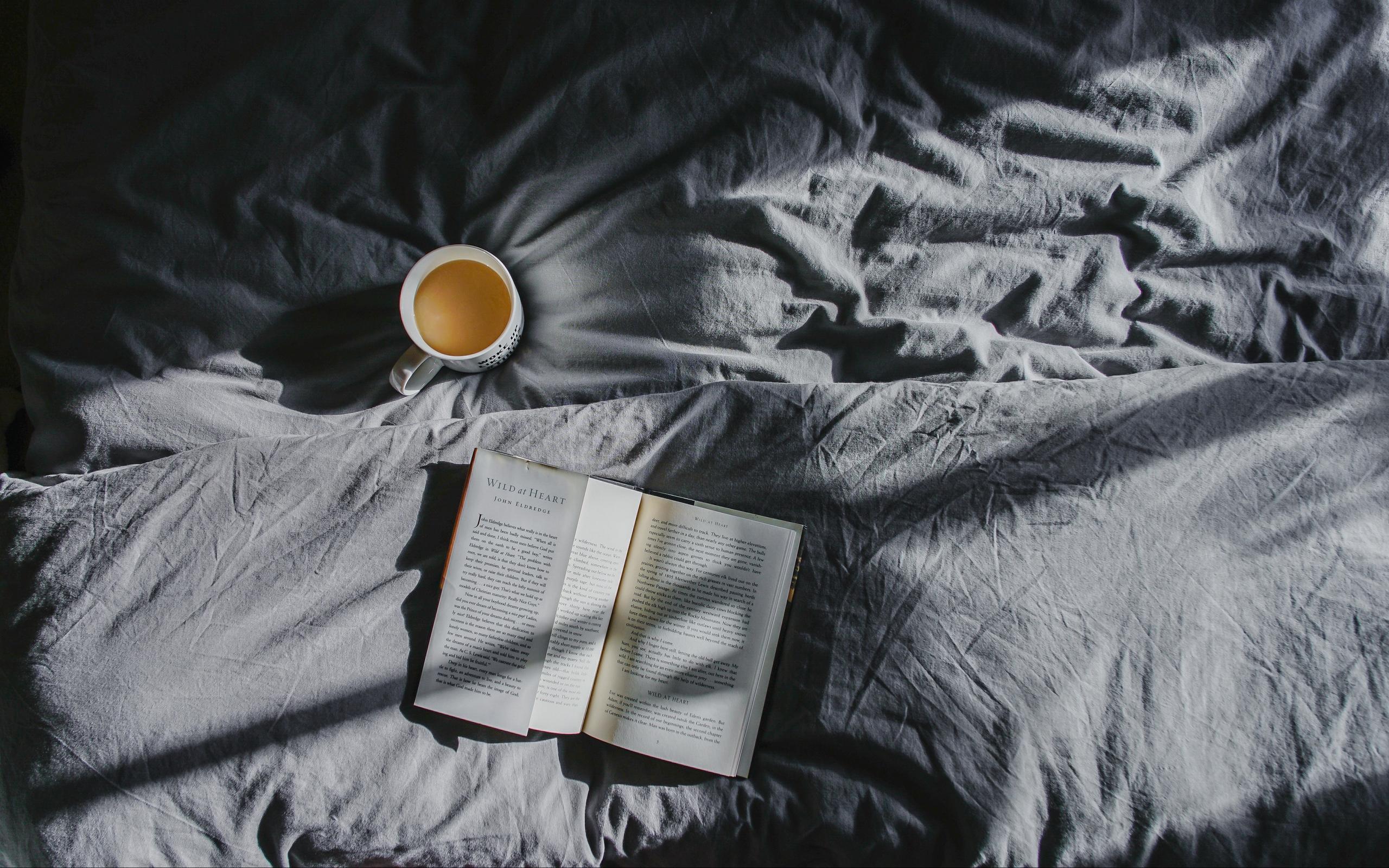Download wallpaper 2560x1600 book, coffee, bed, shadow