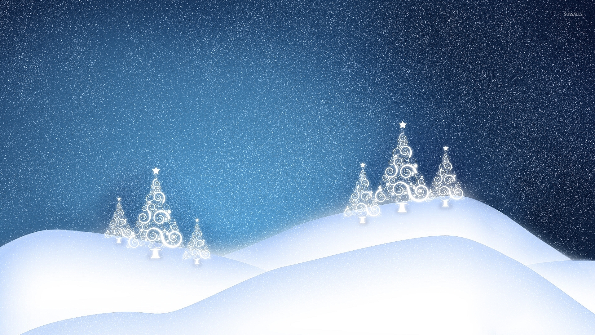 White glowing Christmas tree on the snowy hills wallpaper wallpaper