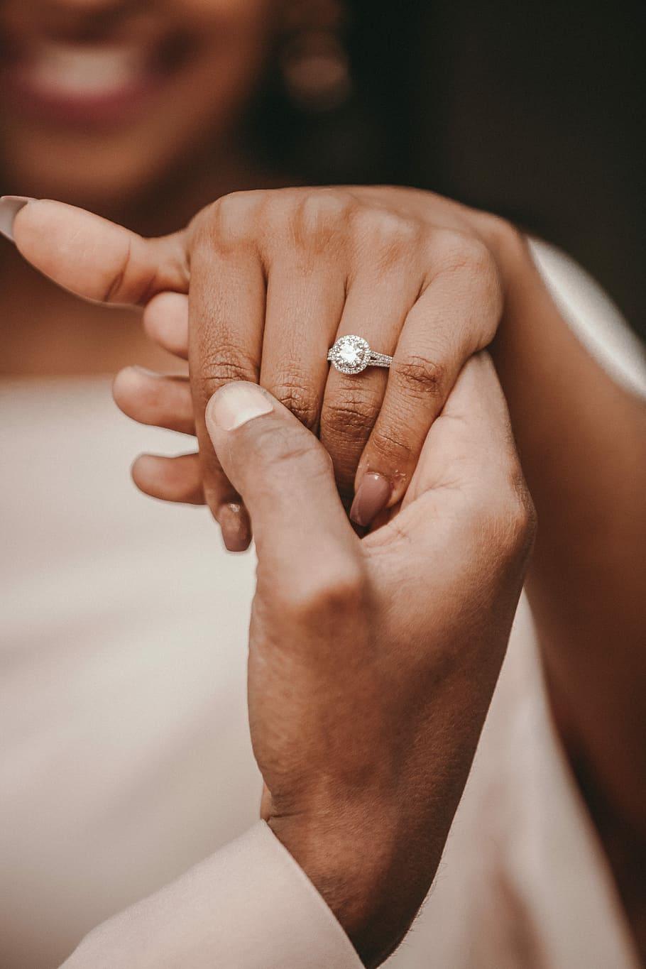 HD wallpaper: couple holding hands, person holding hand of woman with ring
