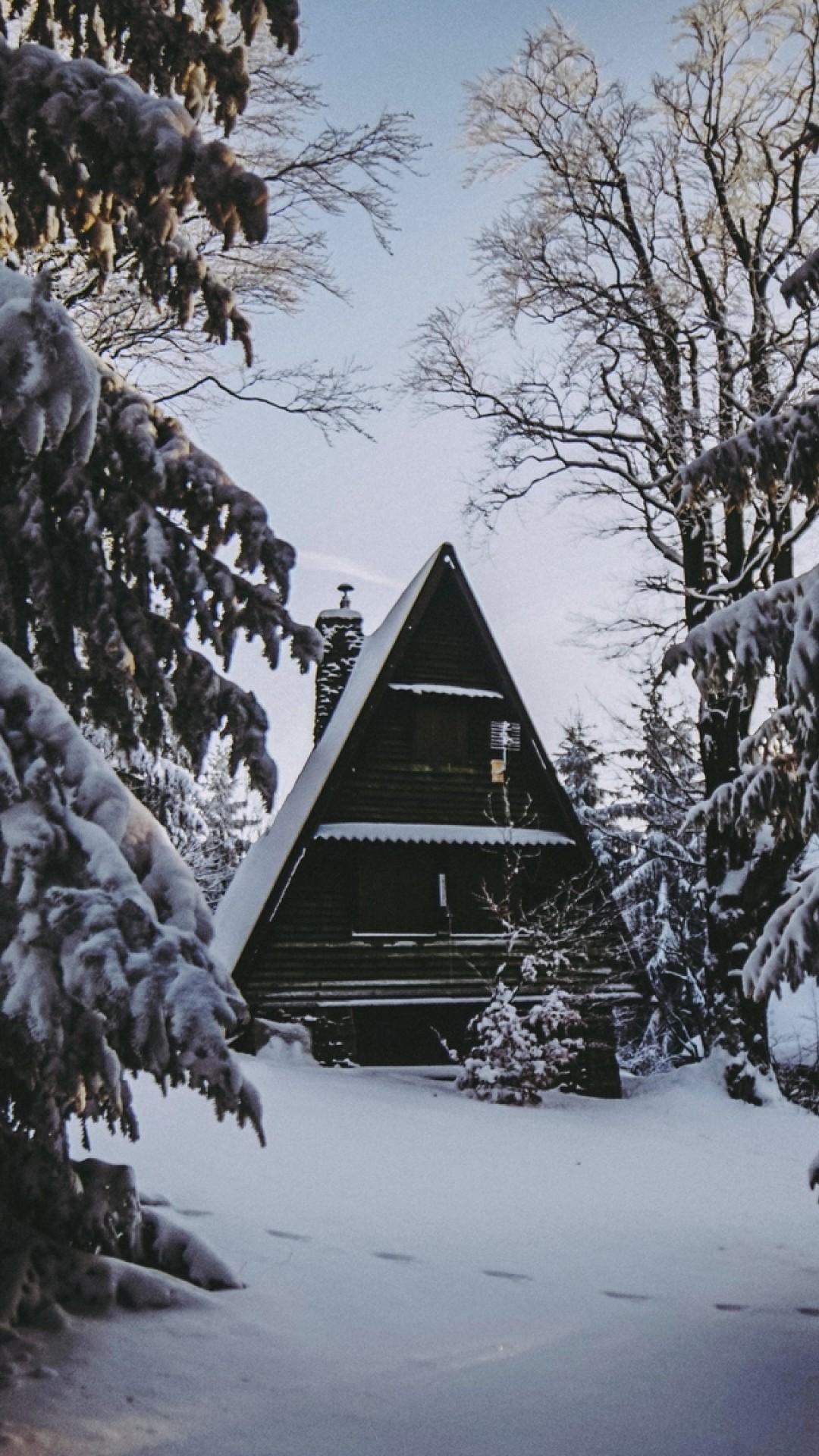 House in the middle of a snowy forest HD Wallpaper iPhone 6