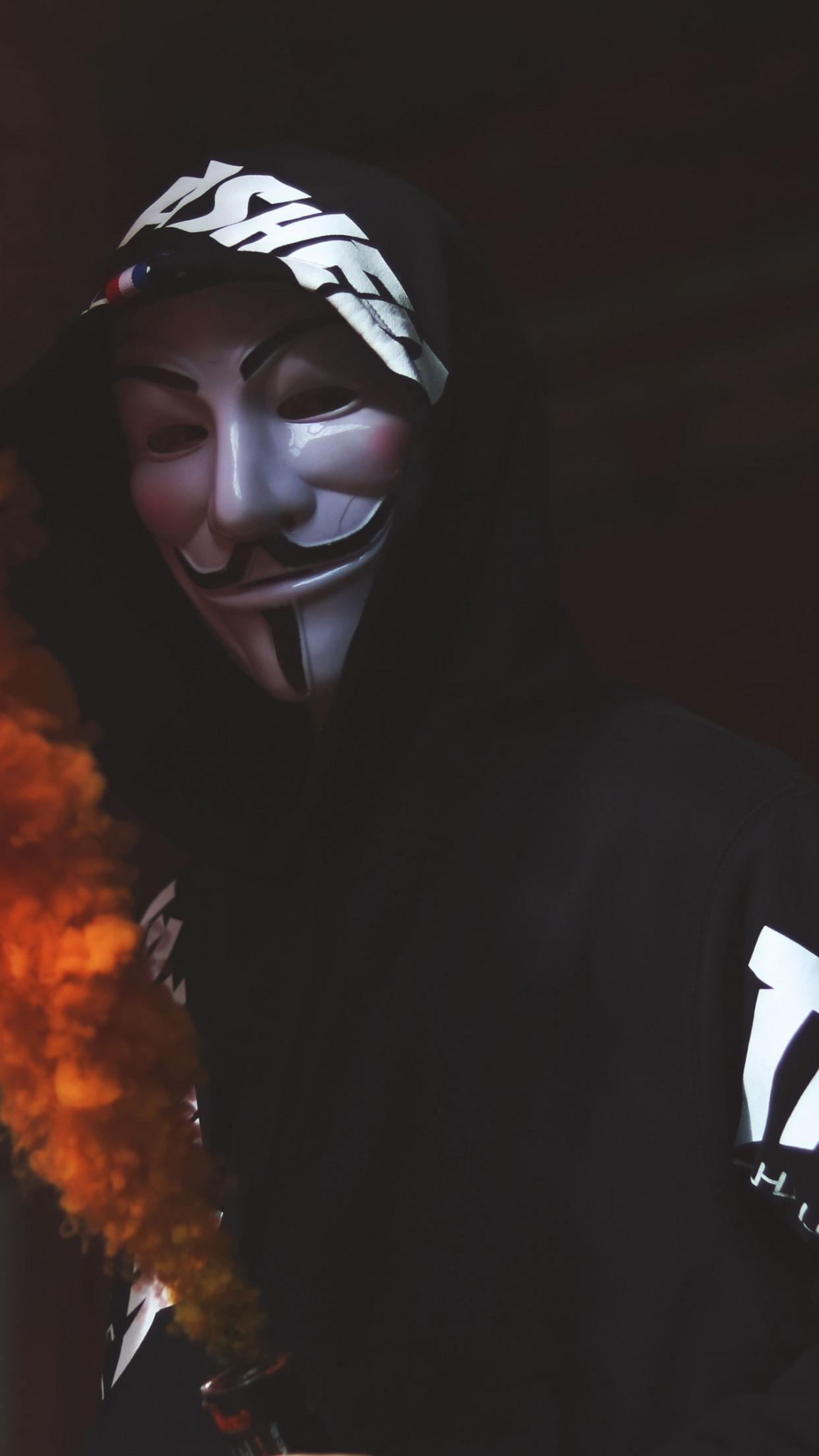 Download wallpaper: Anonymous mask and orange smoke 1242x2208