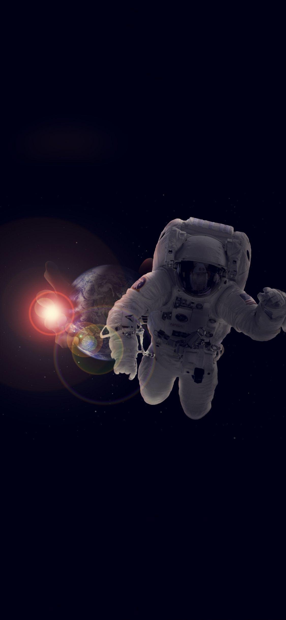 Astronaut, dark, deep space, earth, 1125x2436 wallpaper. HD