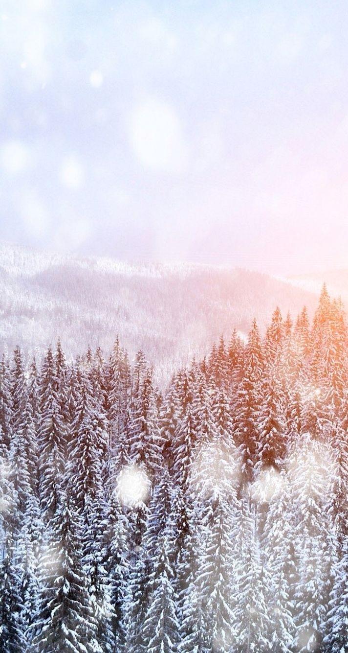 Snowfalling trees iPhone wallpaper. Wallpaper iphone christmas, Winter wallpaper, iPhone wallpaper winter