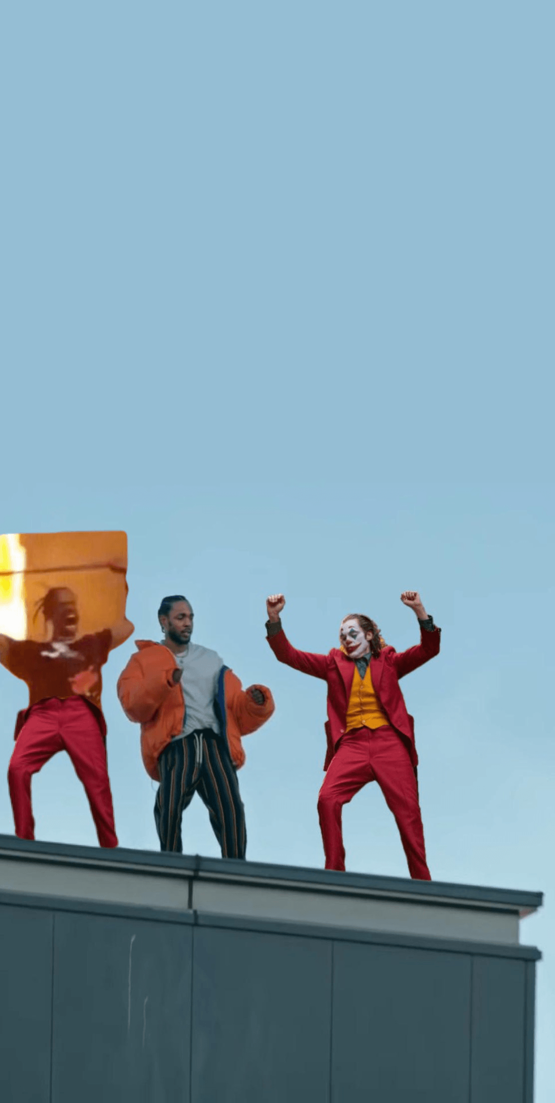 Wallpaper of Kenny and Joker dancing on the roof with Travis