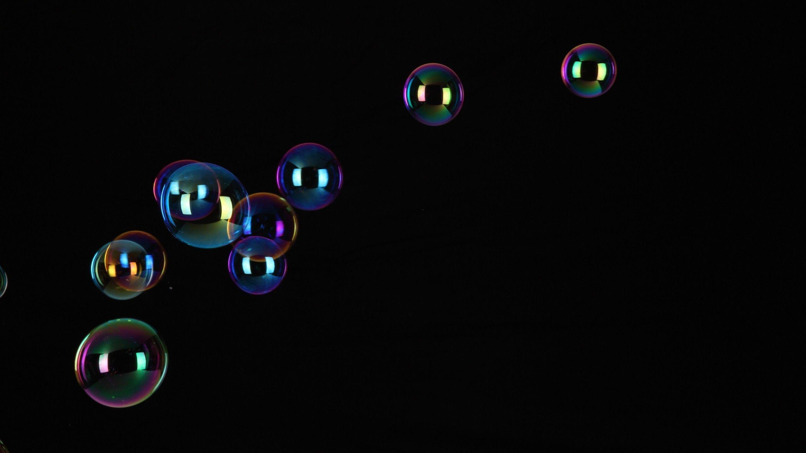 black background bubbles iridescence minimalistic soap
