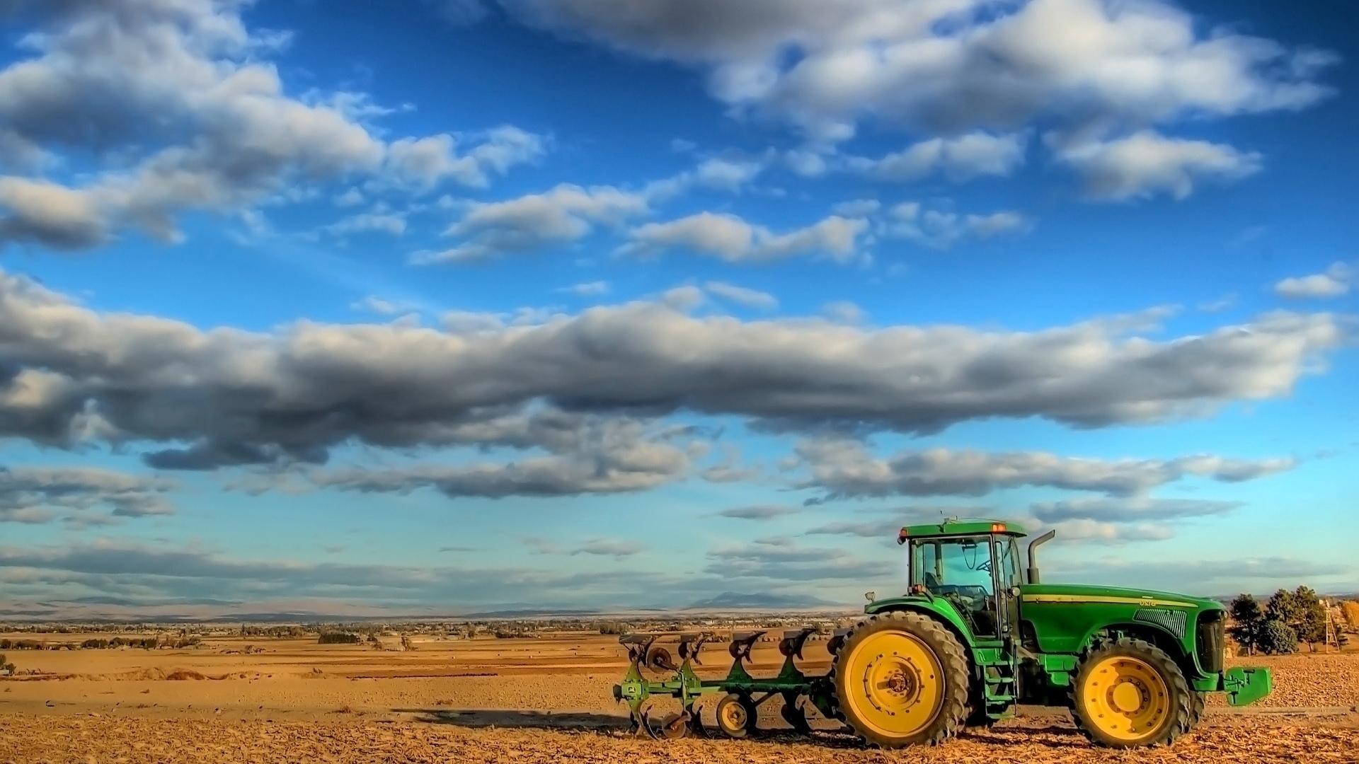 Download wallpaper 1920x1080 tractor, field, plowing, clouds