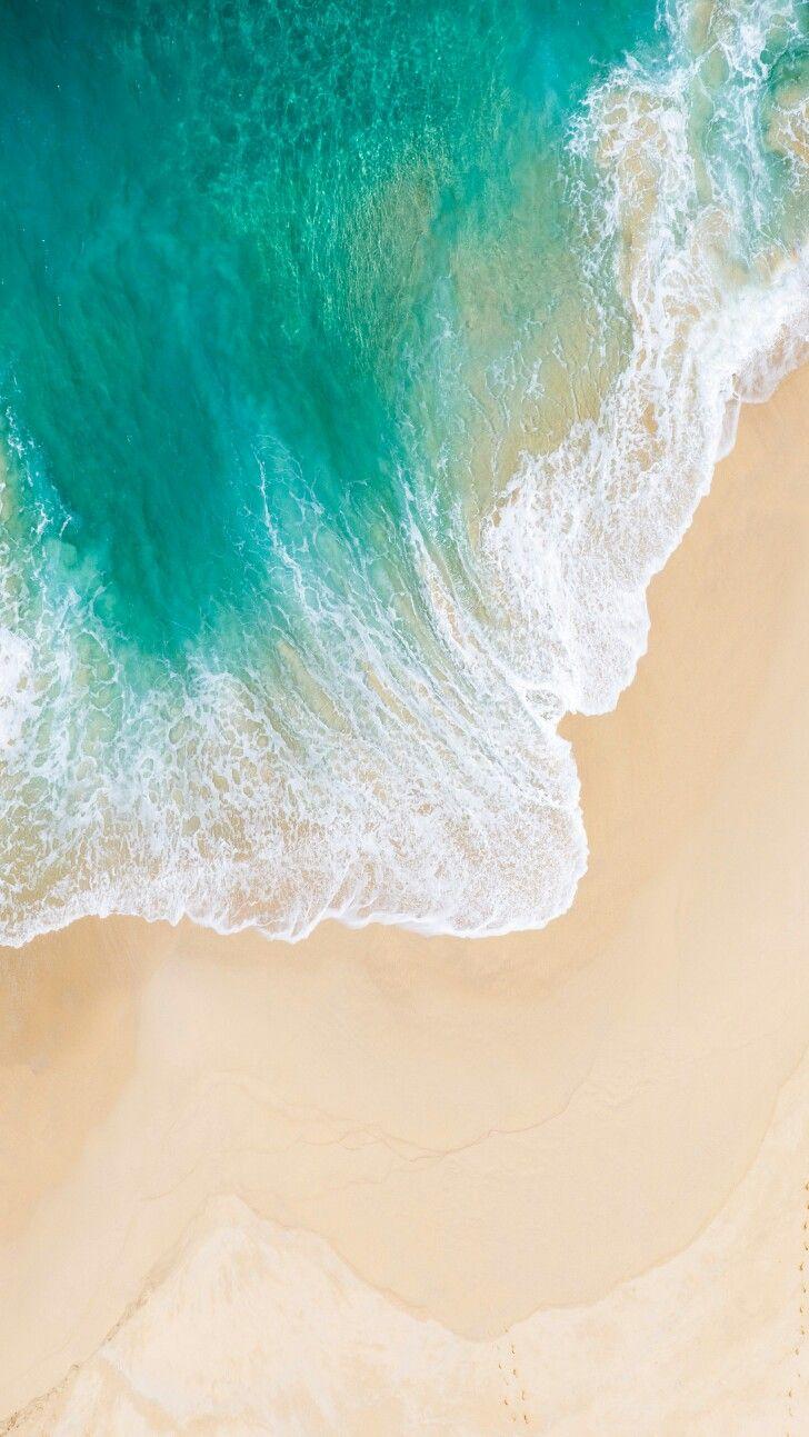 Swirling waves on the shore. Ocean wallpaper, Beach