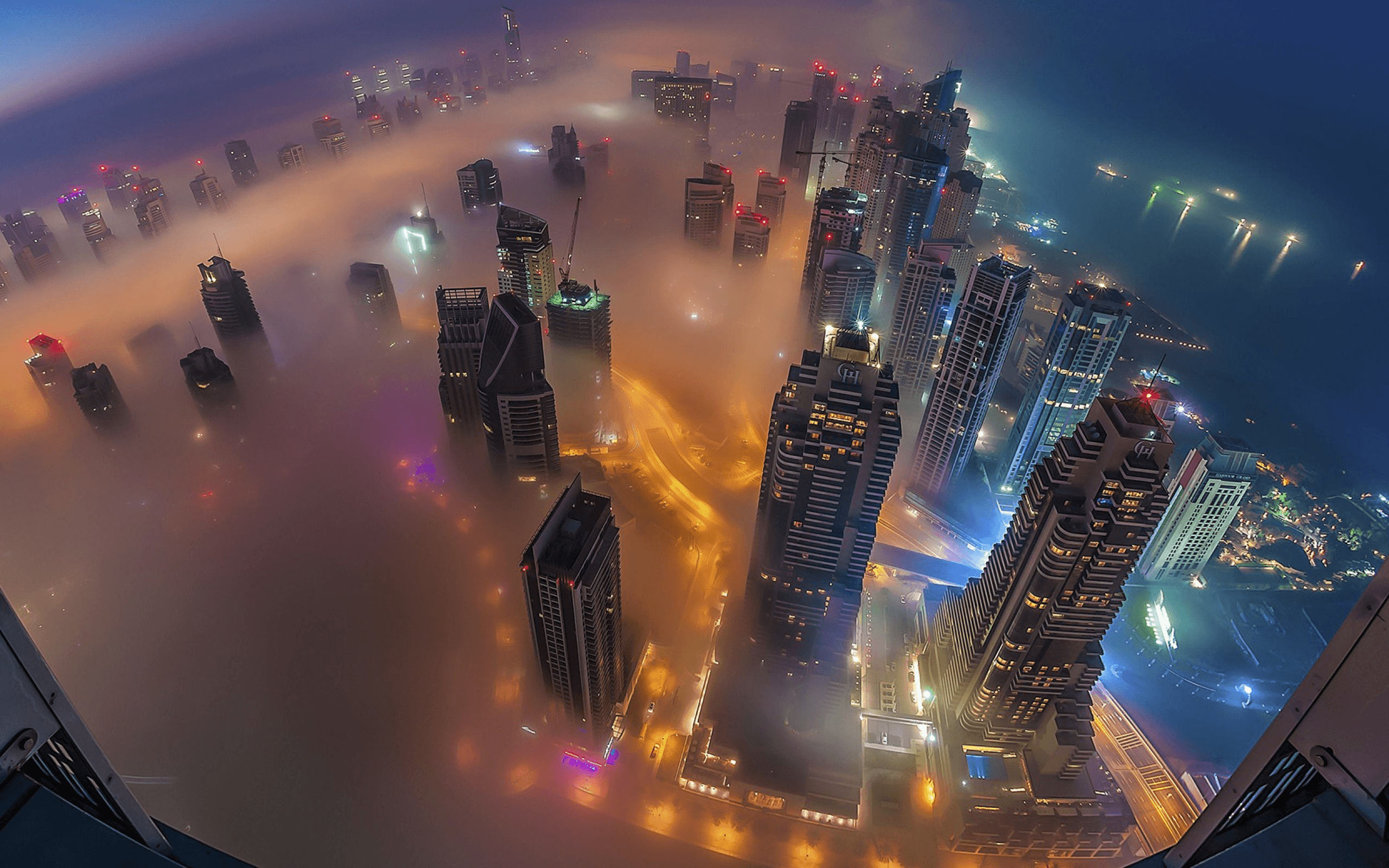 Download 2560x1600 dubai, aerial view, night, smog, mist
