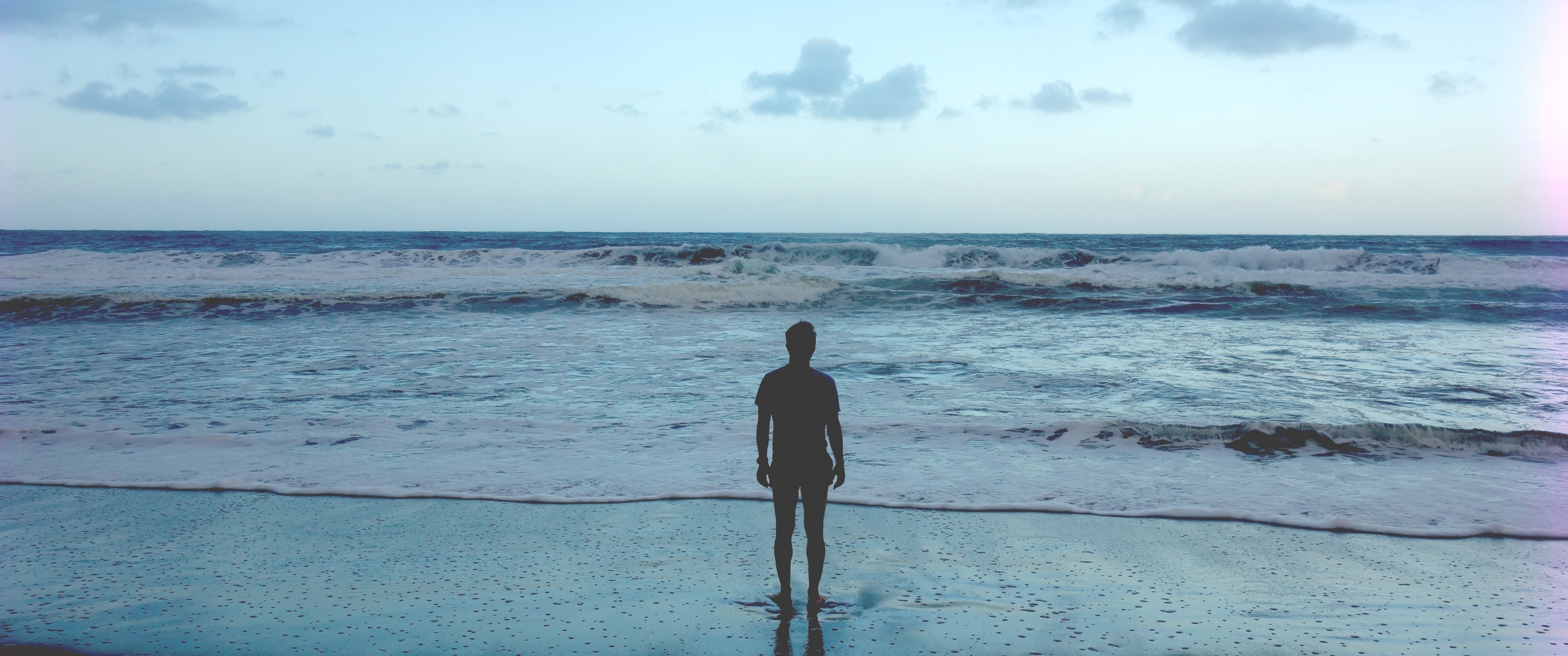 Man Standing At Ocean Shore 3440x1440 Resolution