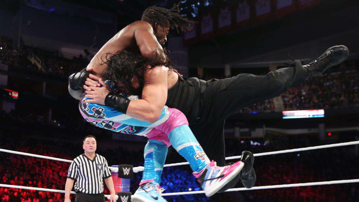 Spear To Kofi Wwe Survivor Series Roman Reigns Wallpaper