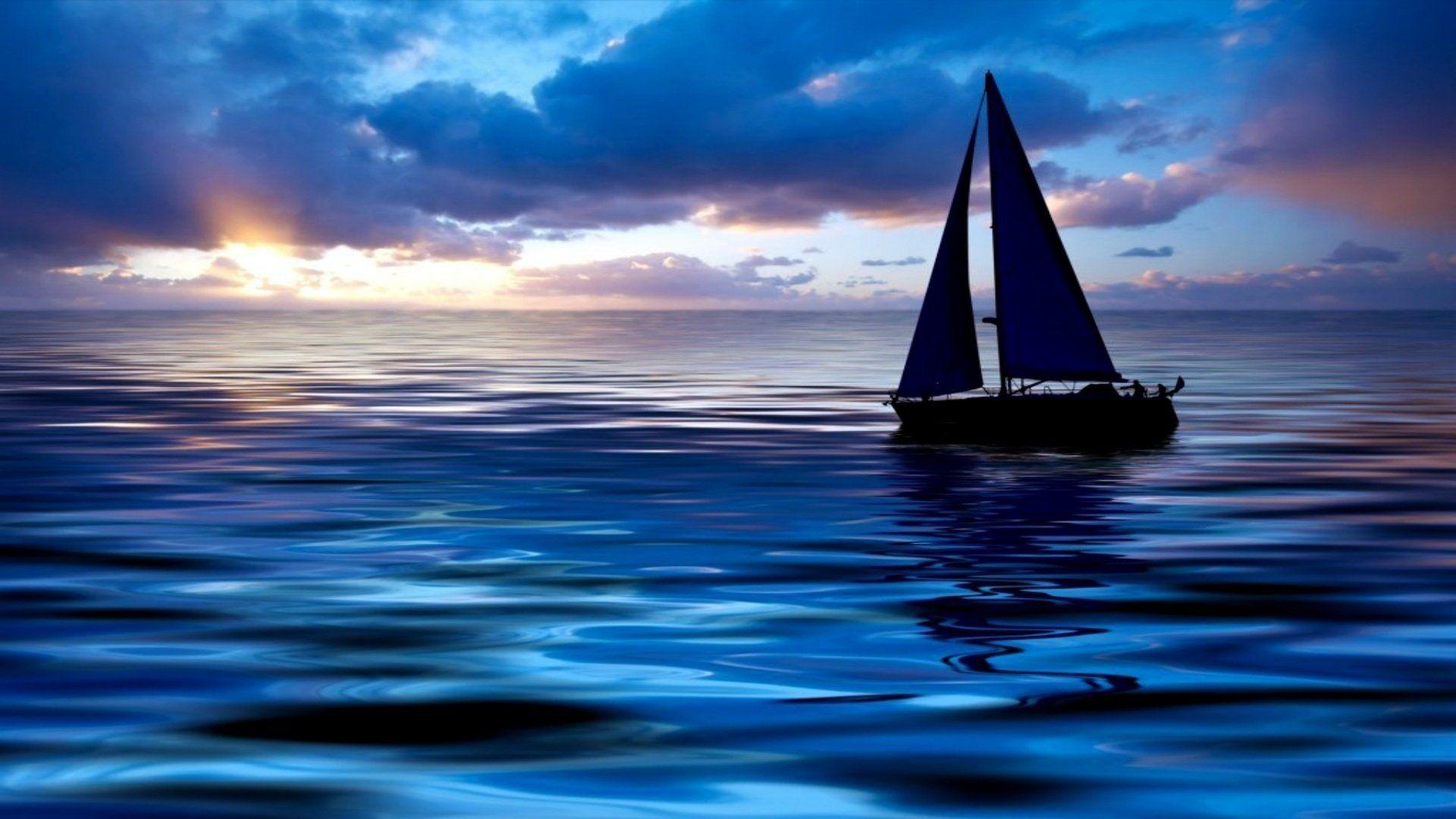 ocean sailboat sunset