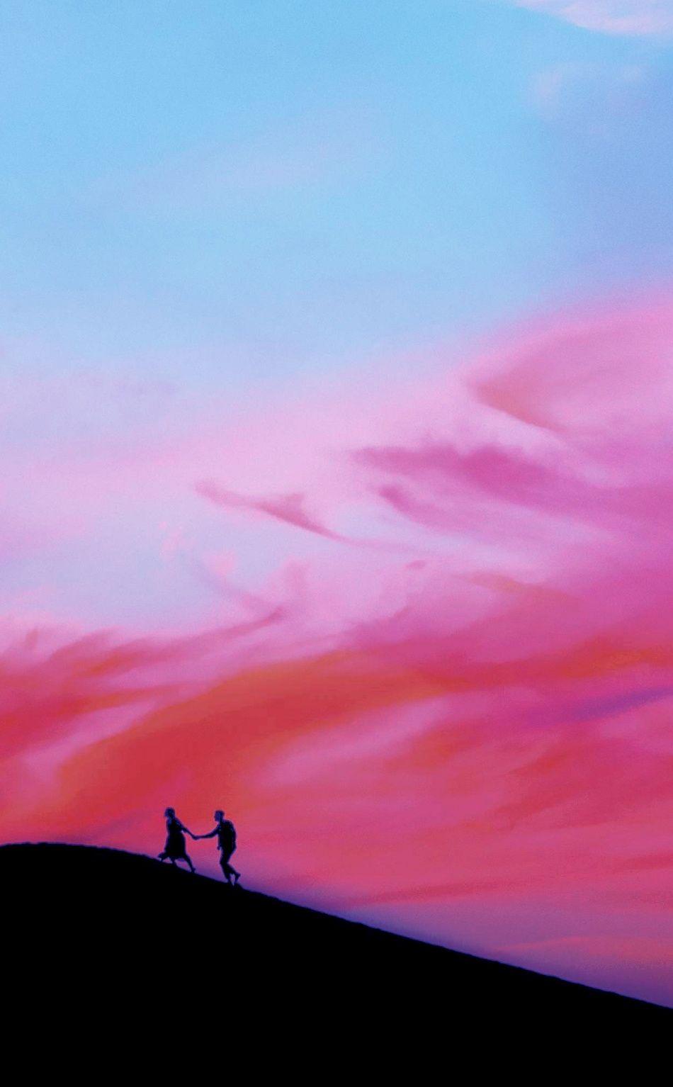 Couple, walking over mountain, sunset, silhouette, 950x1534