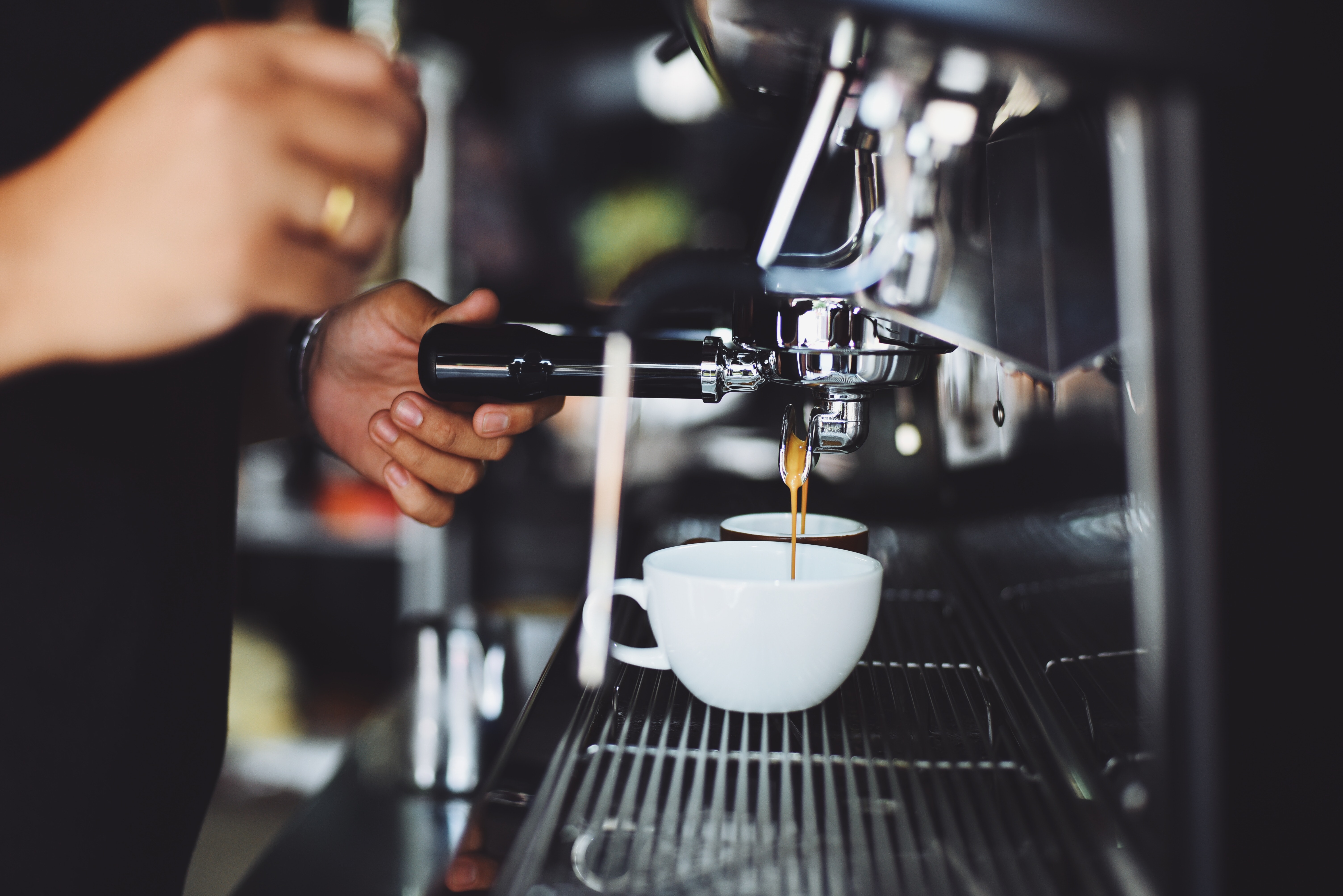 Person Using Espresso Machine · Free