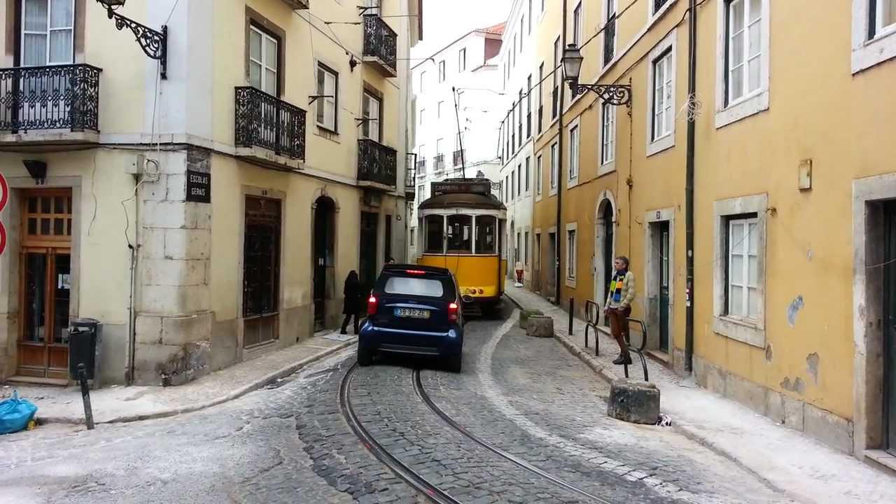 Tram on narrow street Wallpaper