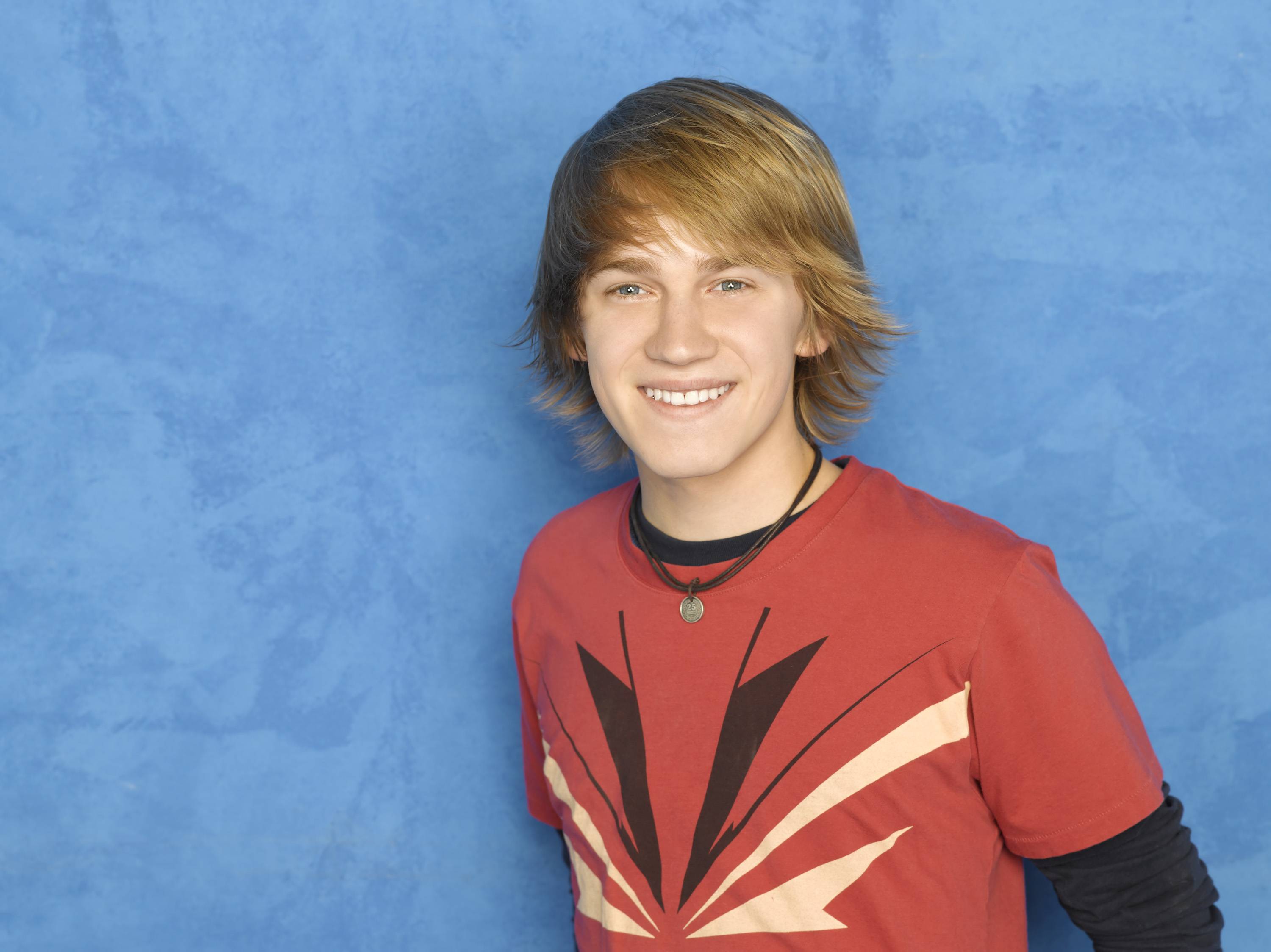 nick braun and jason dolley smile with selena gomez at her album