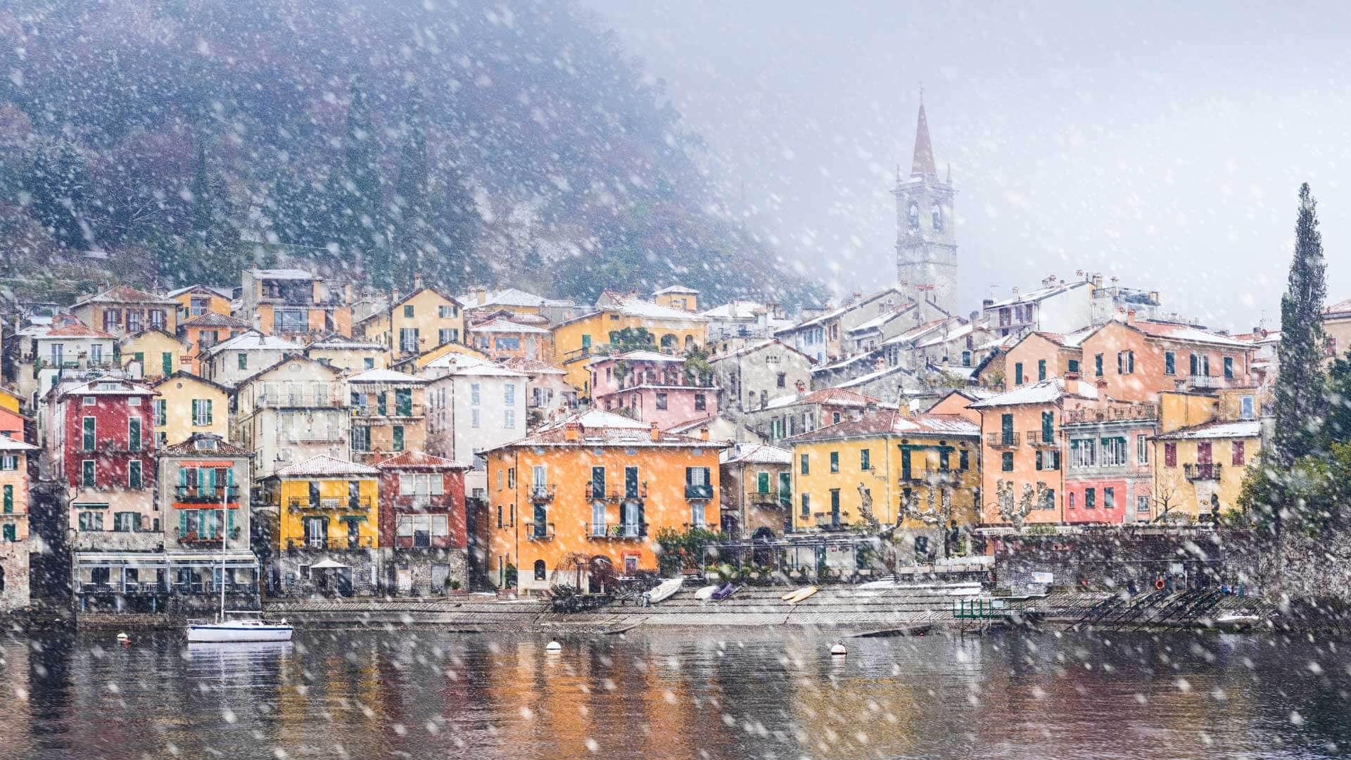 Snow falls on Lake Como