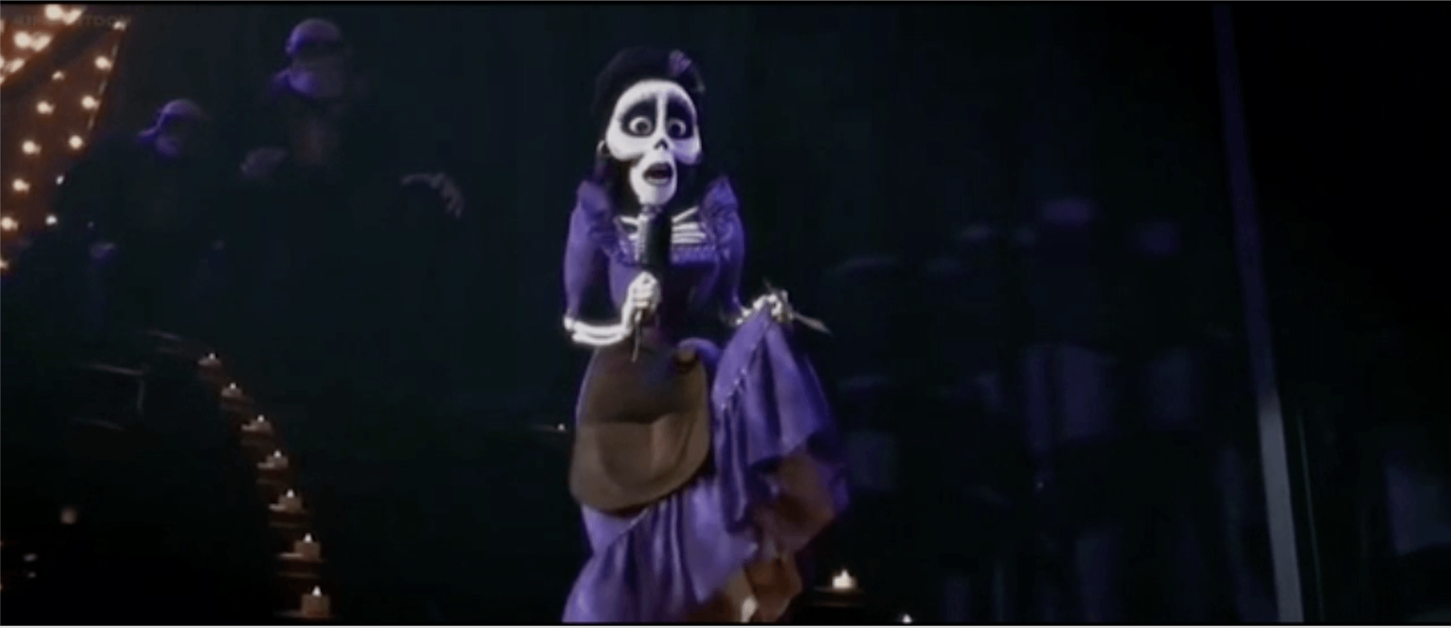 Imelda singing La Llorona on stage as she picked up the skirts