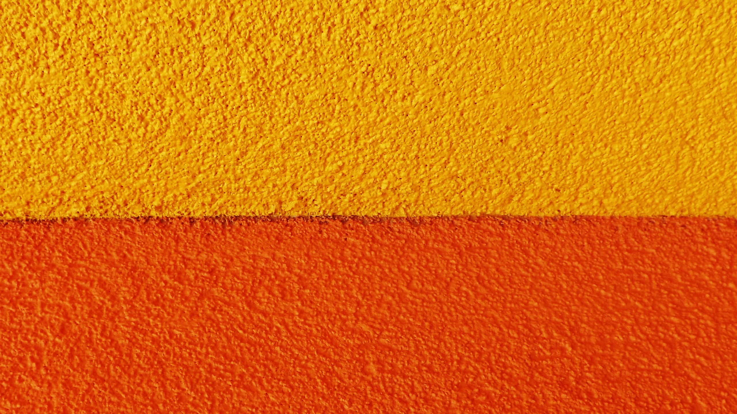 Download wallpaper 2560x1440 paint, wall, rough, orange, yellow