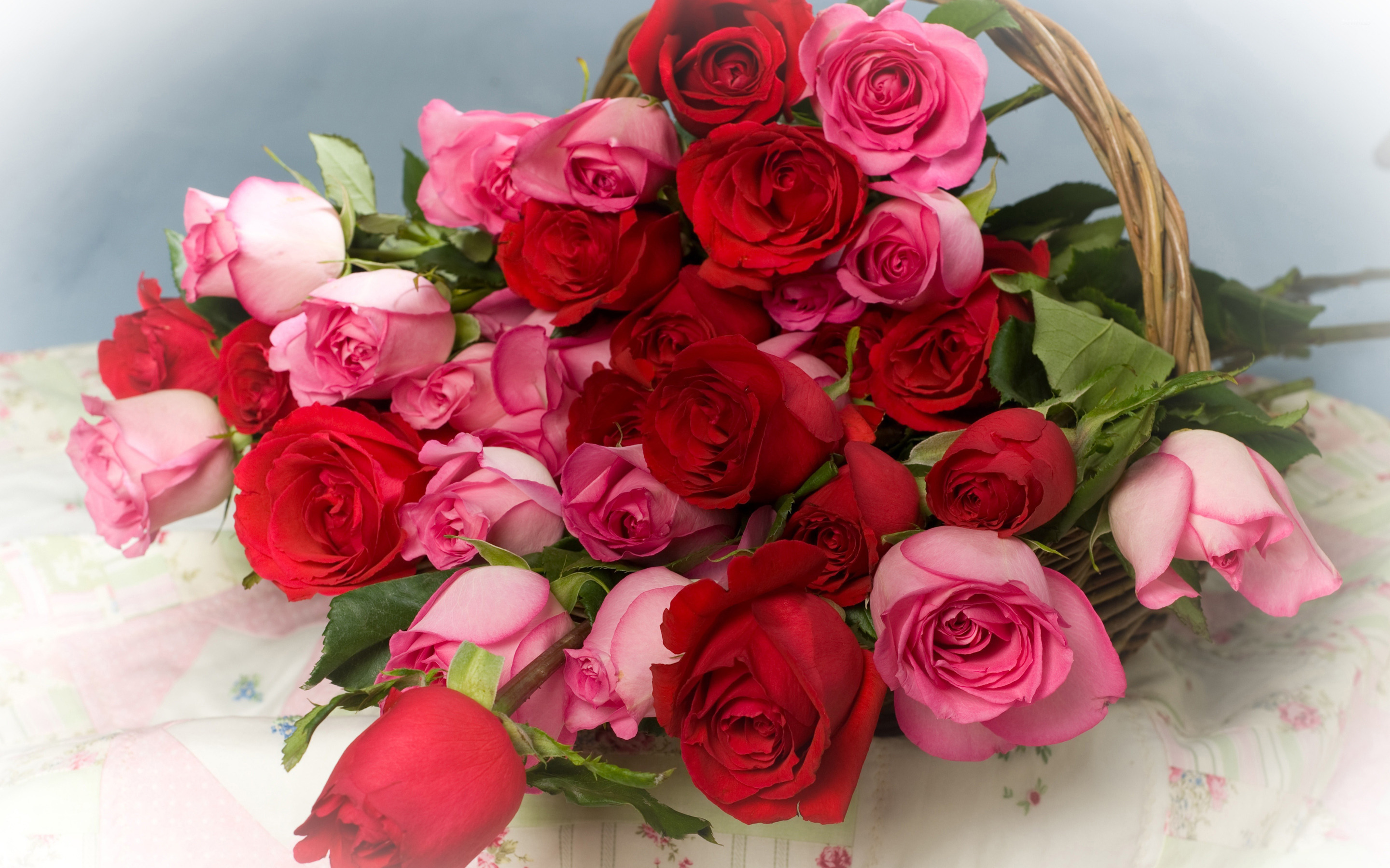 Pink and red roses in a basket wallpaper wallpaper