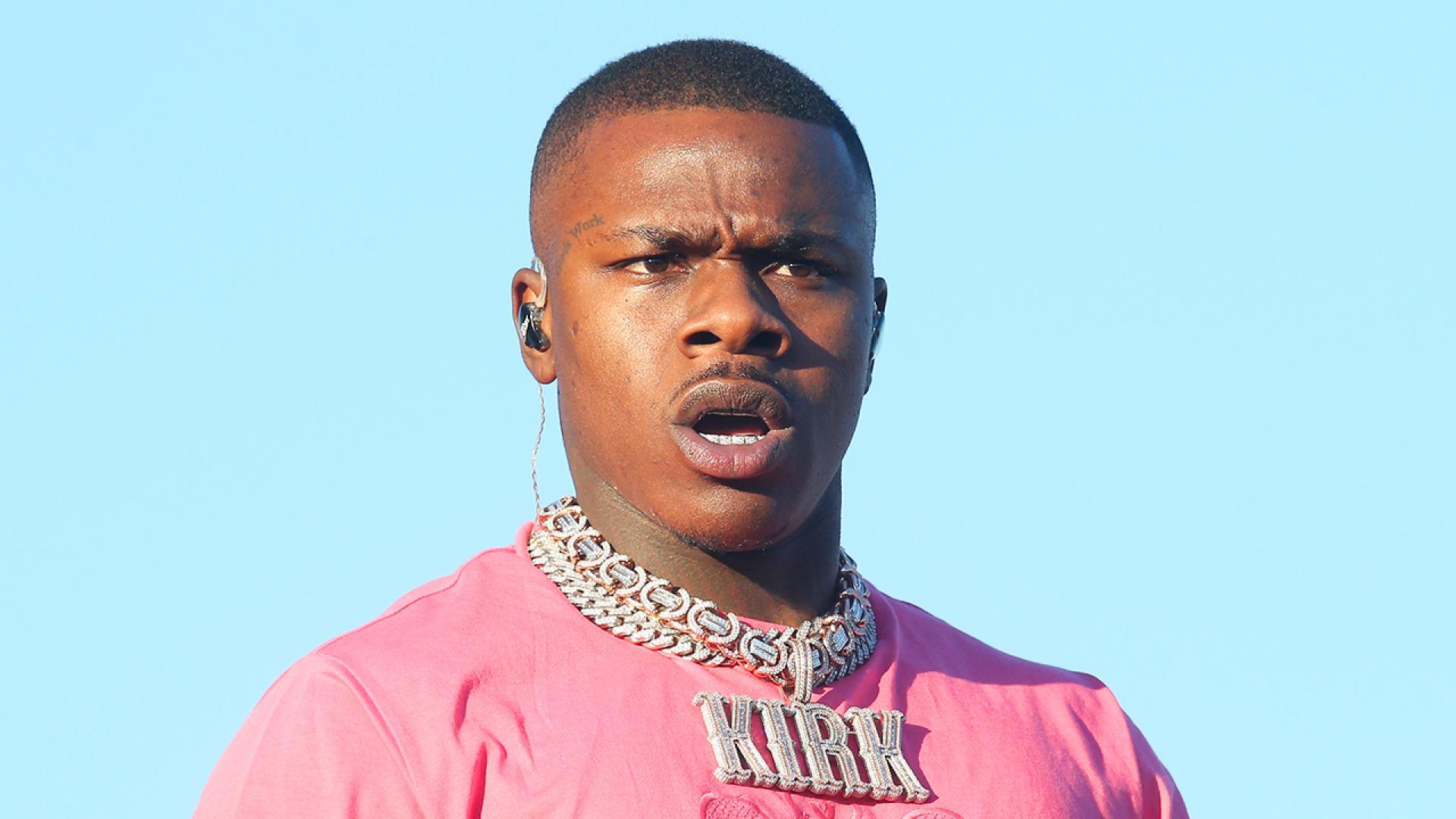 DaBaby Leaves Concert in Handcuffs, Hours After Handing Out