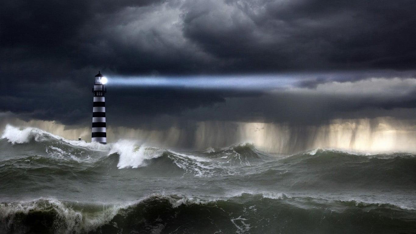 Landscape Photography Of Lighthouse In The Middle Of