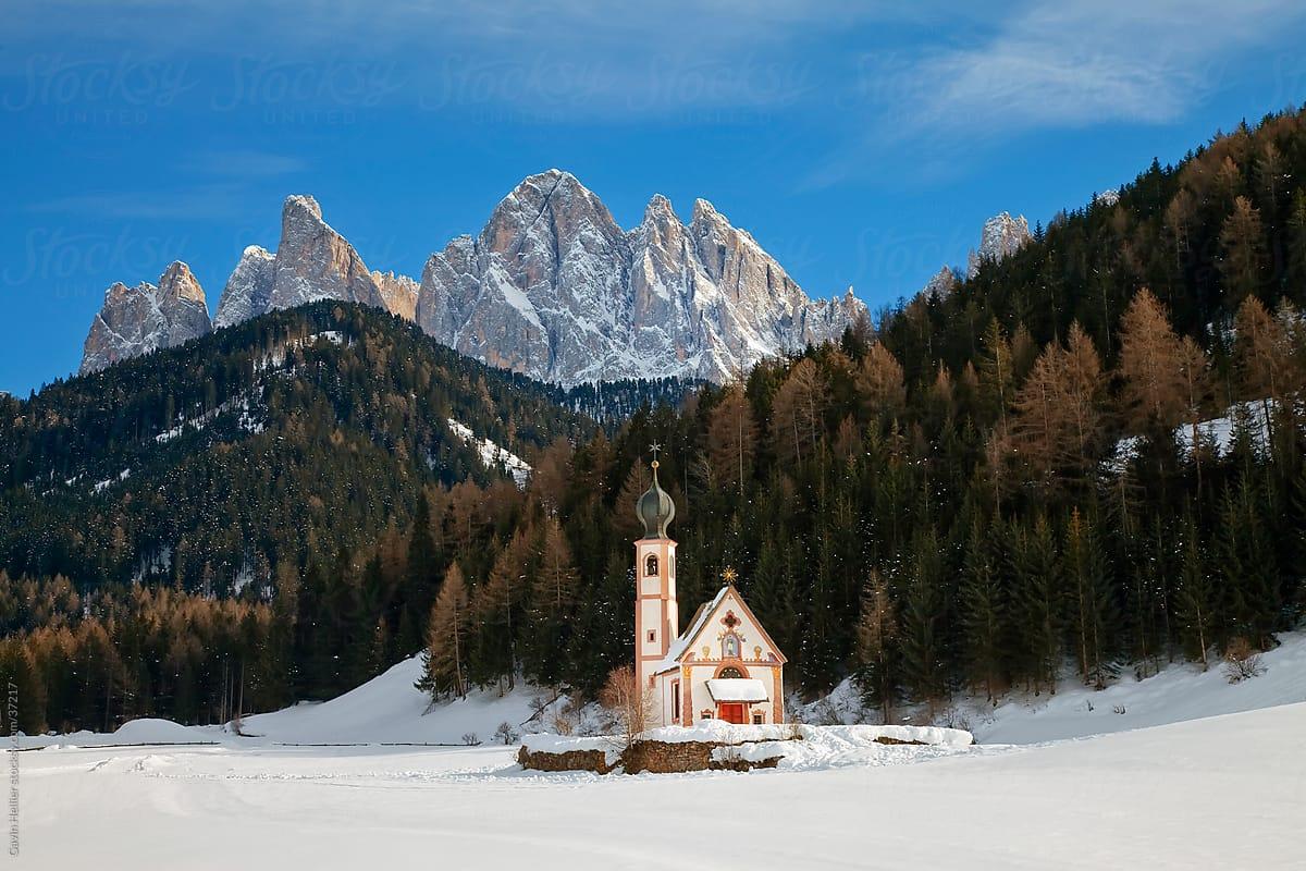 Winter landscape of St Johann Church in Ranui in Villnoss