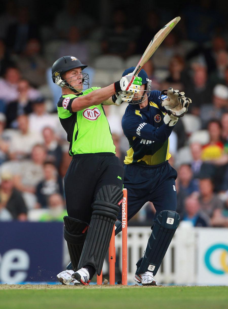 Download Striking Powerhouse - Jason Roy with Bat and Helmet in Action  Wallpaper | Wallpapers.com