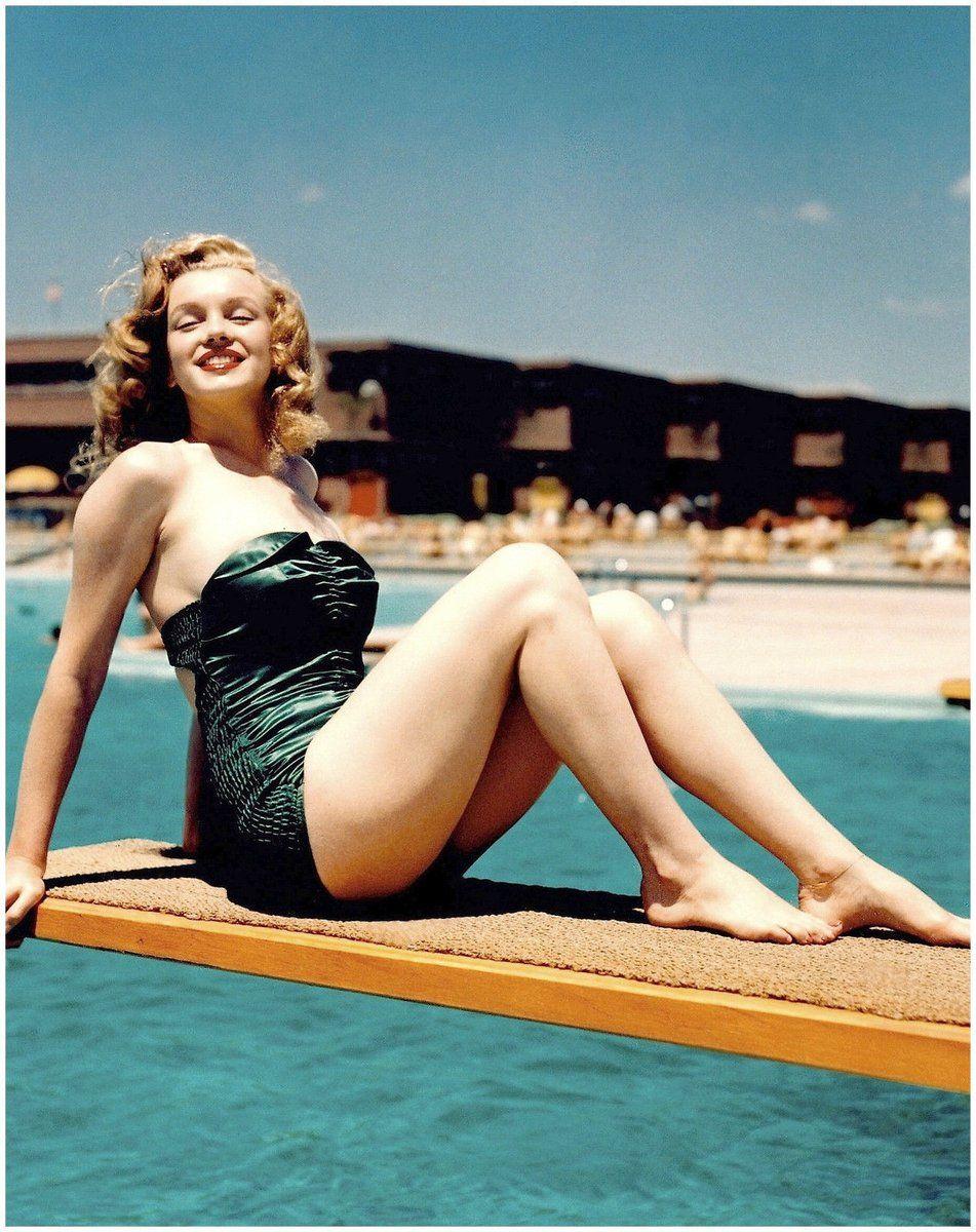 Marilyn Monroe Sitting on Diving Board. 1940's. Marilyn monroe