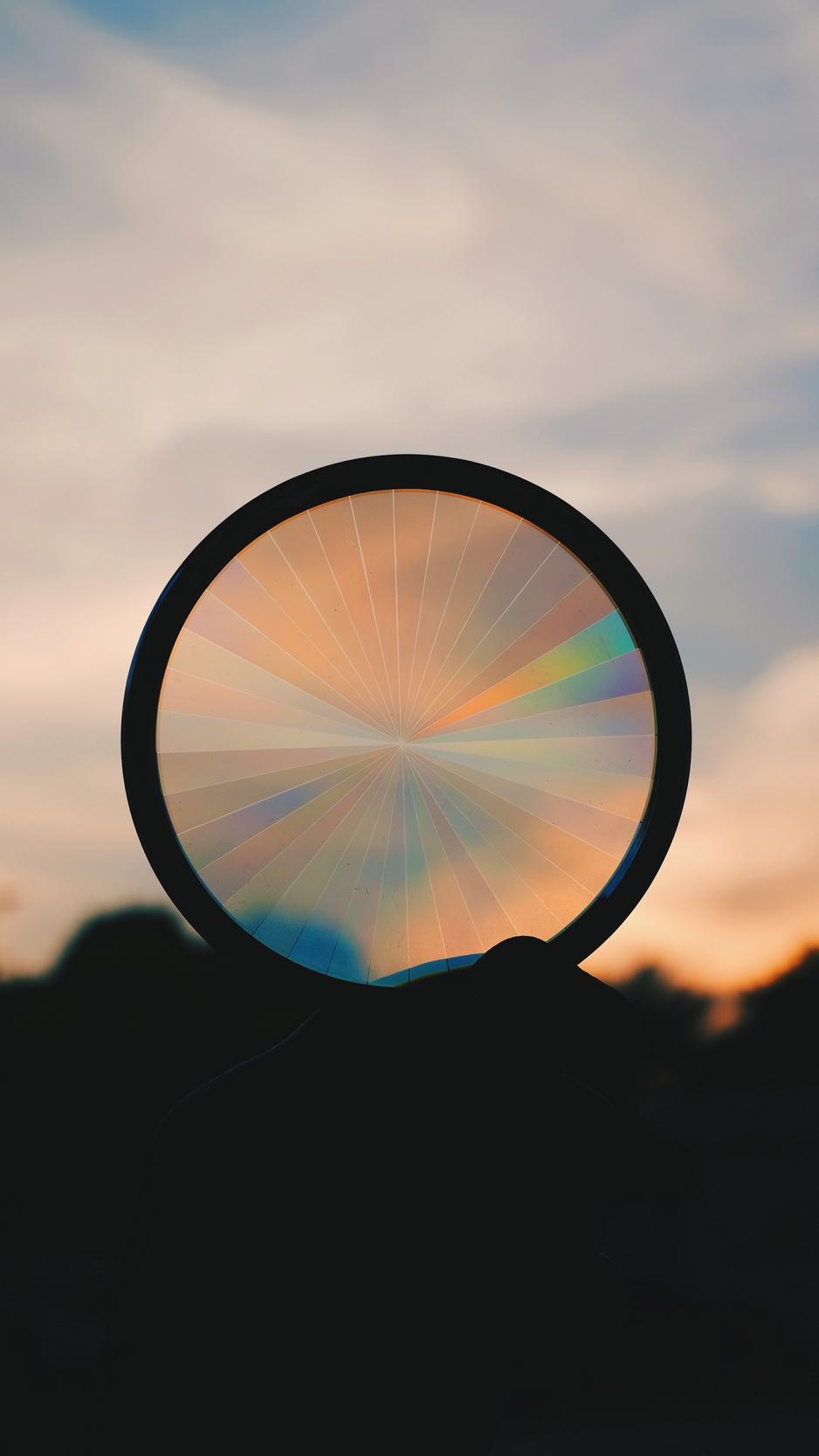 Download wallpaper 938x1668 circle, sunset, rainbow, shape, dark